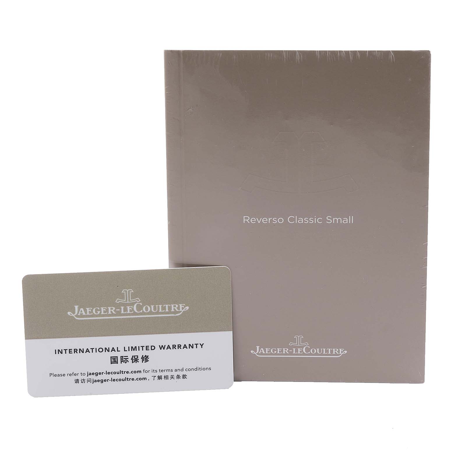 The image shows the Jaeger-LeCoultre Reverso Classic Small booklet and an International Limited Warranty card.