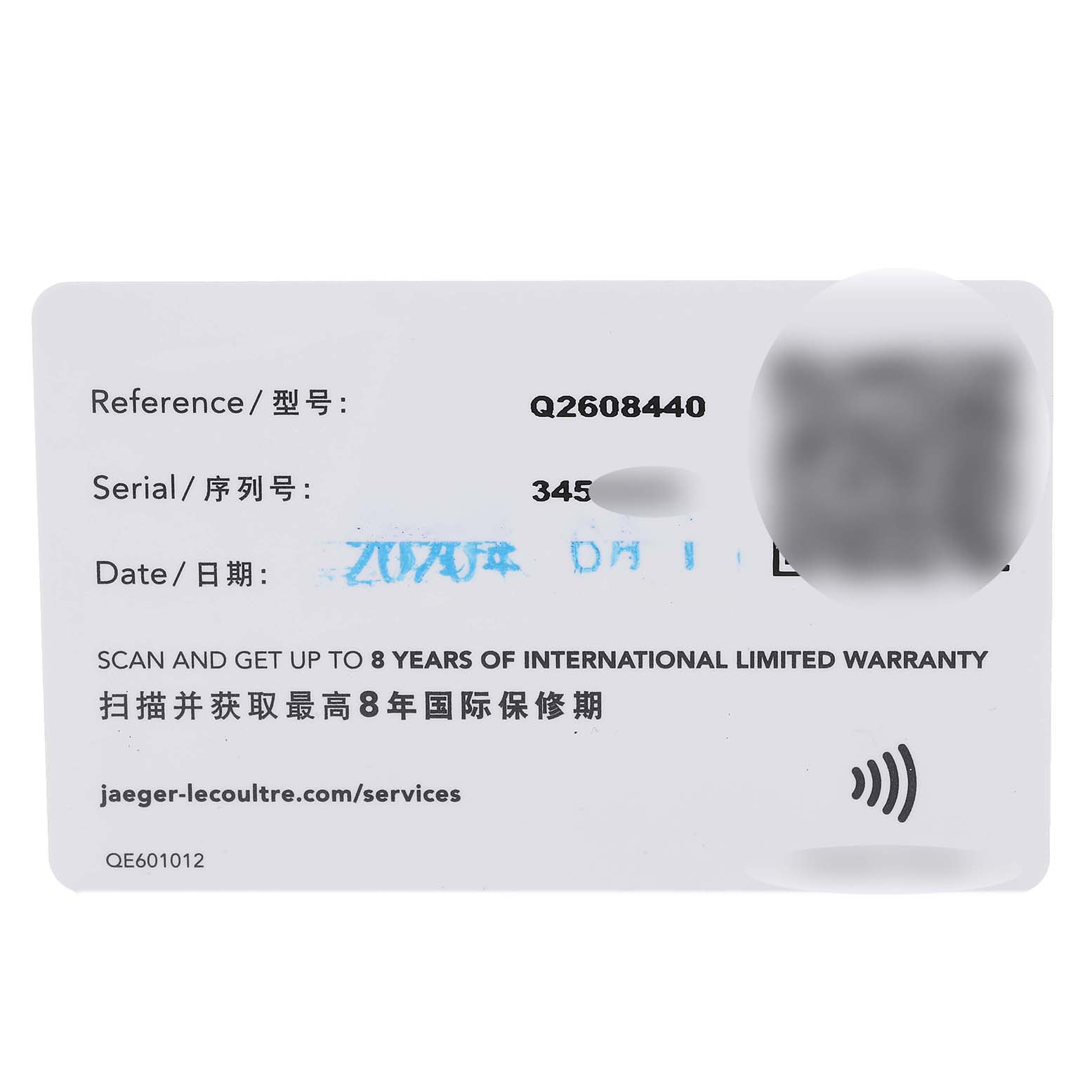 The image shows a warranty card for the Jaeger-LeCoultre Reverso model, displaying reference and serial numbers.