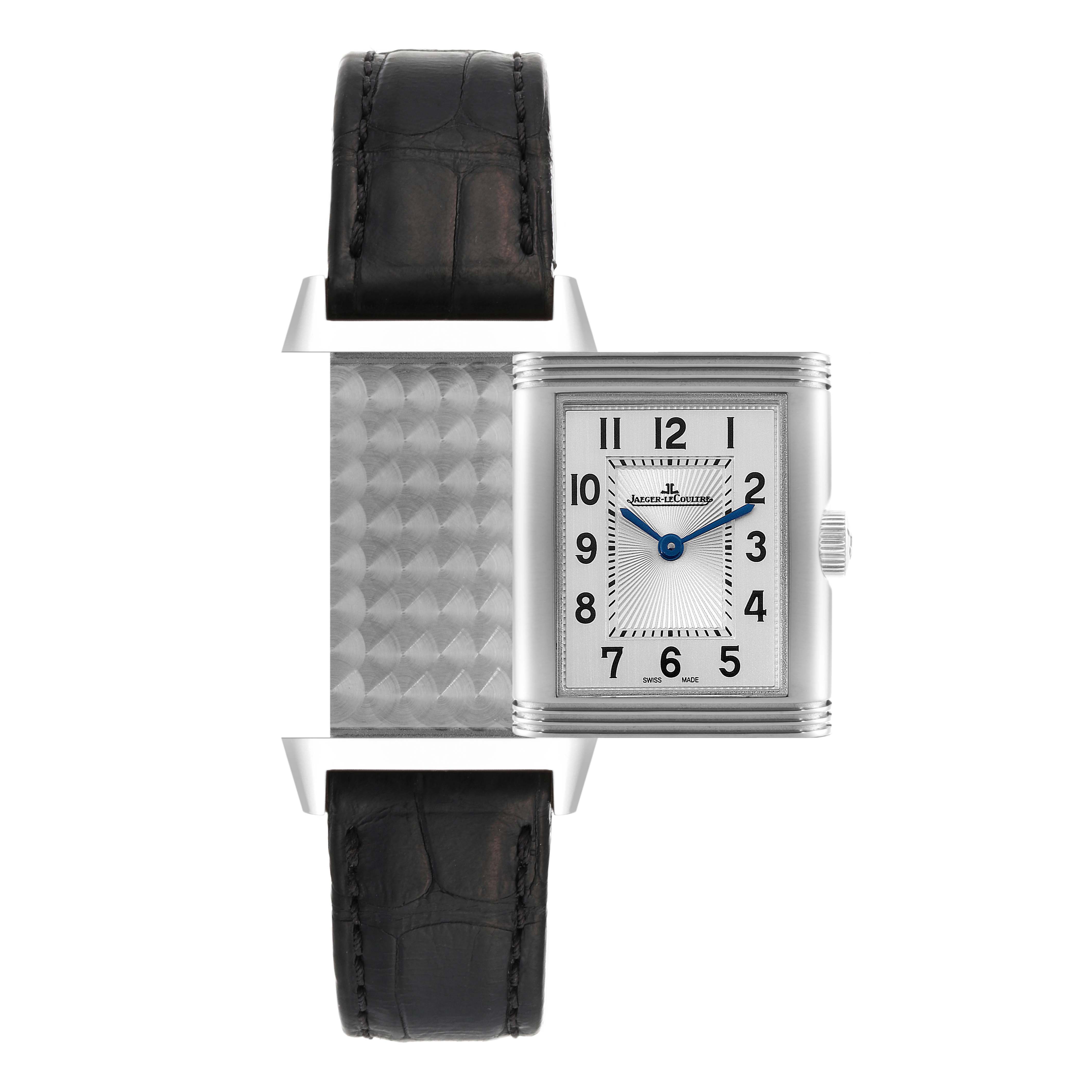 The image showcases the Reverso model by Jaeger LeCoultre, displaying its reversible case and black leather strap.