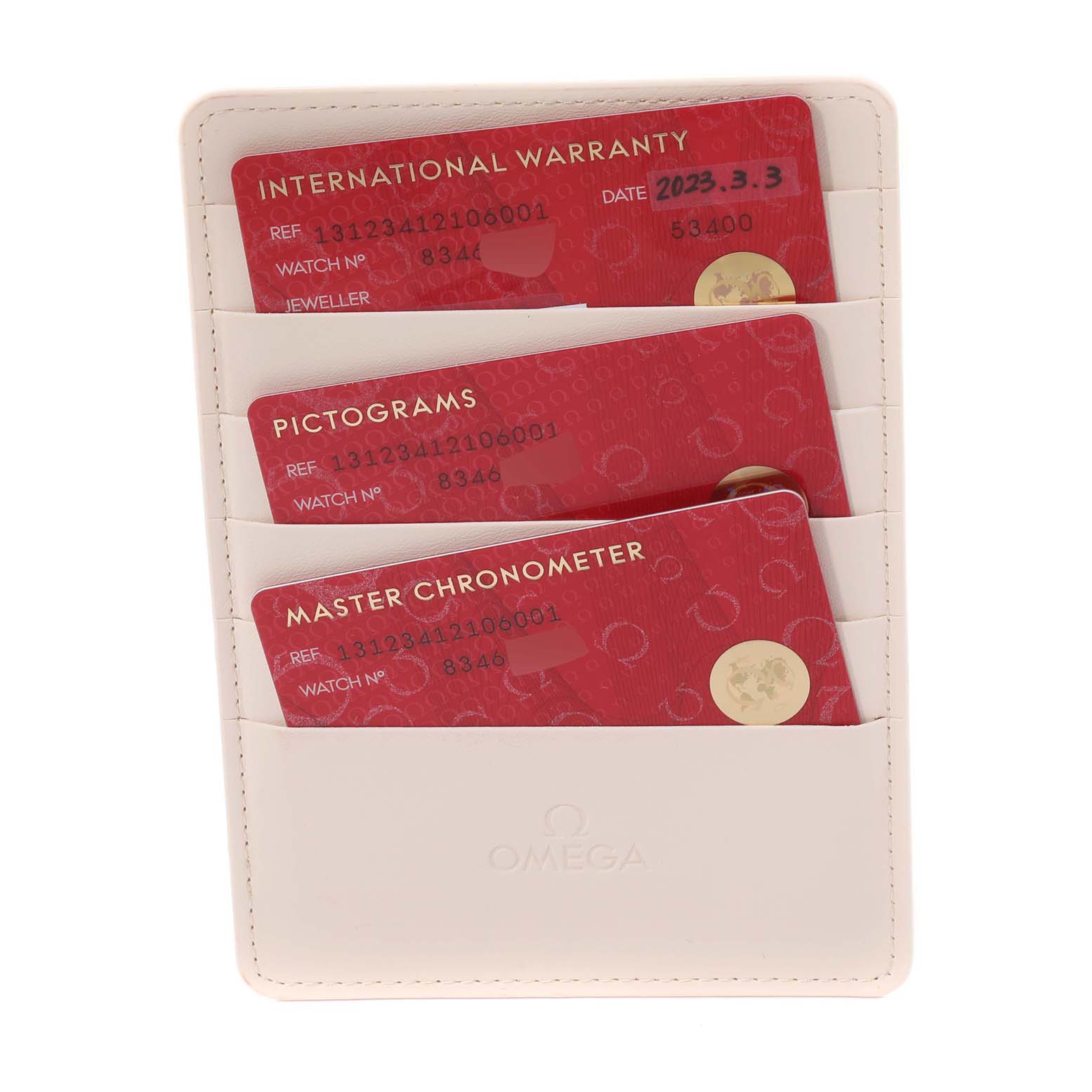 The image shows warranty cards for an Omega Constellation 131.23.41.21.06.001 Men's Steel and Gold (two tone) Silver Dial 131.23.41.21.06.001 Men's Steel and Gold (two tone) Silver Dial watch in a white Omega-branded cardholder, taken from a top-down angle.