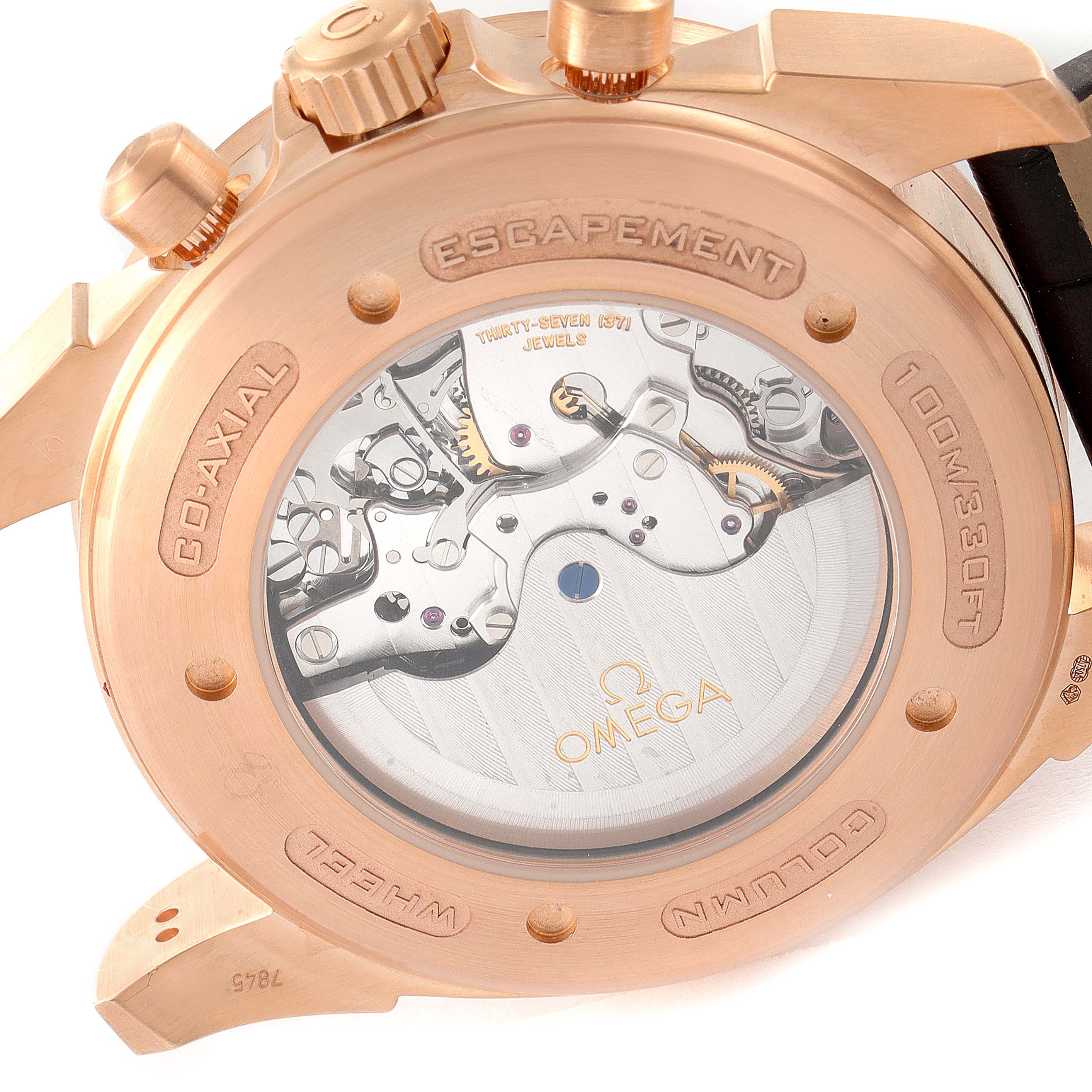 The image shows the back of an Omega De Ville 422.53.44.52.13.001 Men's Rose Gold Black Dial 422.53.44.52.13.001 Men's Rose Gold Black Dial watch, highlighting the inner mechanical movement and engravings.