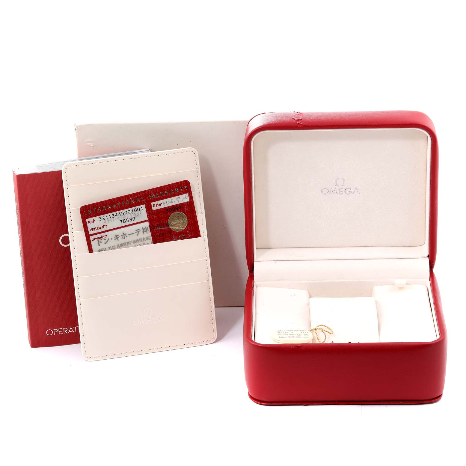 The image shows the box, cardholder with cards, and operating instructions for the Omega Speedmaster 321.13.44.50.01.001 Men's Stainless Steel Black Dial 321.13.44.50.01.001 Men's Stainless Steel Black Dial watch.