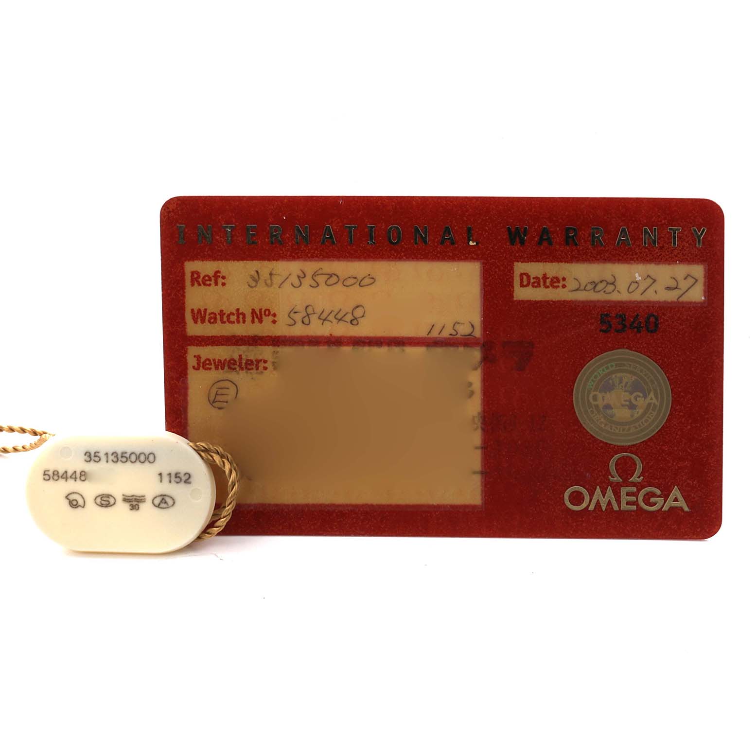 The image shows an Omega Speedmaster 3513.50.00 Men's Stainless Steel Black Dial 3513.50.00 Men's Stainless Steel Black Dial's international warranty card and hang tag.