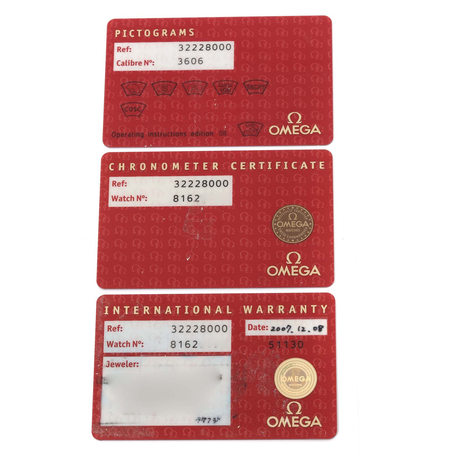 This image shows the Pictograms, Chronometer Certificate, and International Warranty cards for an Omega Speedmaster 3222.80.00 Men's Stainless Steel Blue Dial 3222.80.00 Men's Stainless Steel Blue Dial watch.