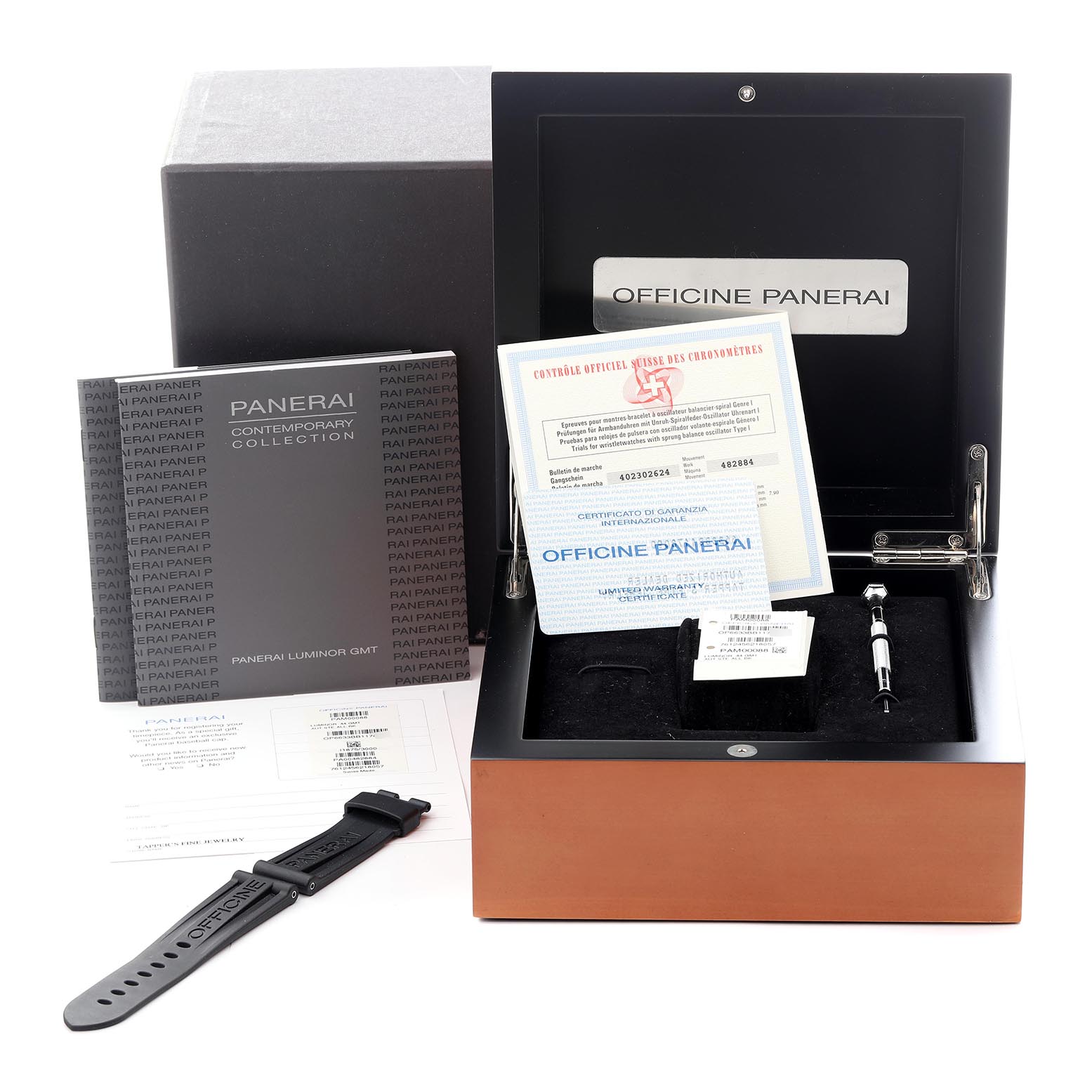 The image shows a Panerai Luminor PAM00088 Men's Stainless Steel Black Dial PAM00088 Men's Stainless Steel Black Dial watch box with accessories, including manuals, a certification, strap, and tools.
