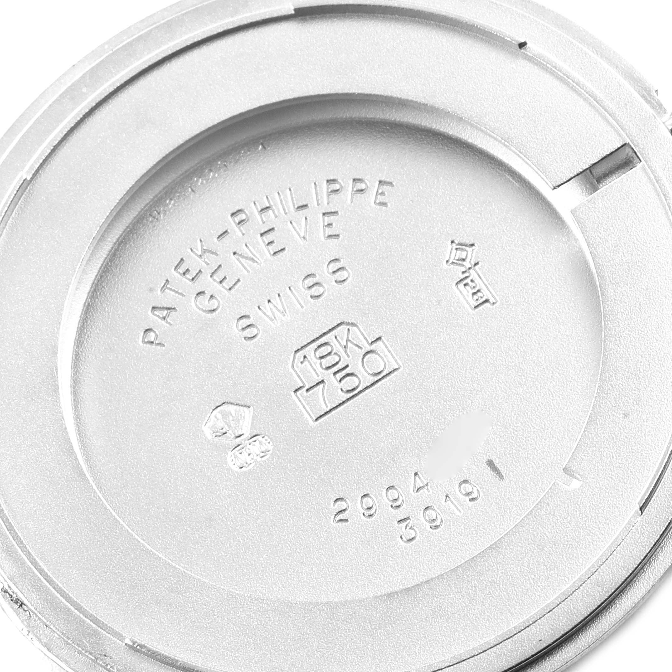 The image shows the inner case back of a Patek Philippe Calatrava 3919G Men's White Gold White Dial 3919G Men's White Gold White Dial watch, highlighting the engravings and hallmarks.
