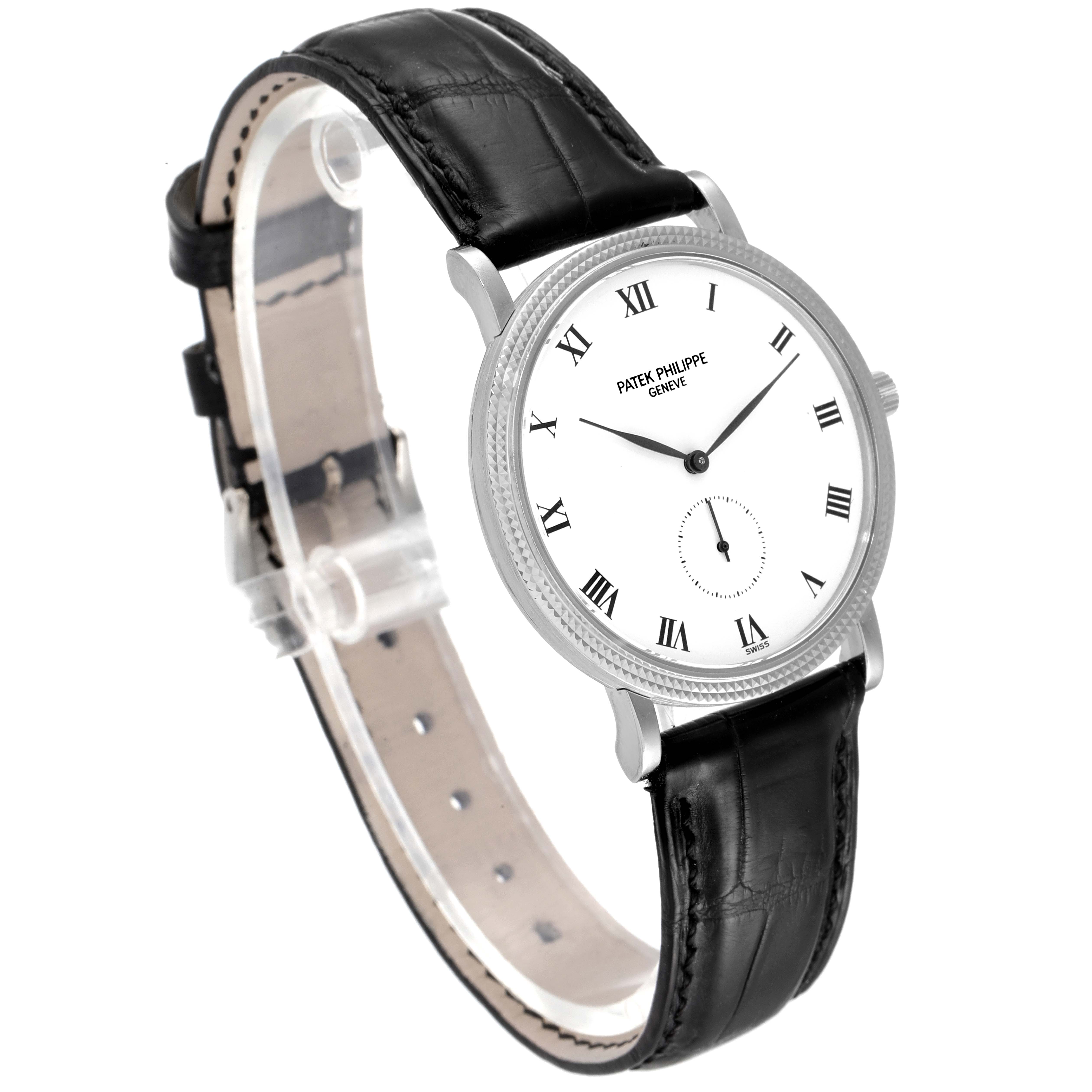 The image shows a side-angle view of the Patek Philippe Calatrava 3919G Men's White Gold White Dial 3919G Men's White Gold White Dial watch, highlighting its face, crown, and leather strap.