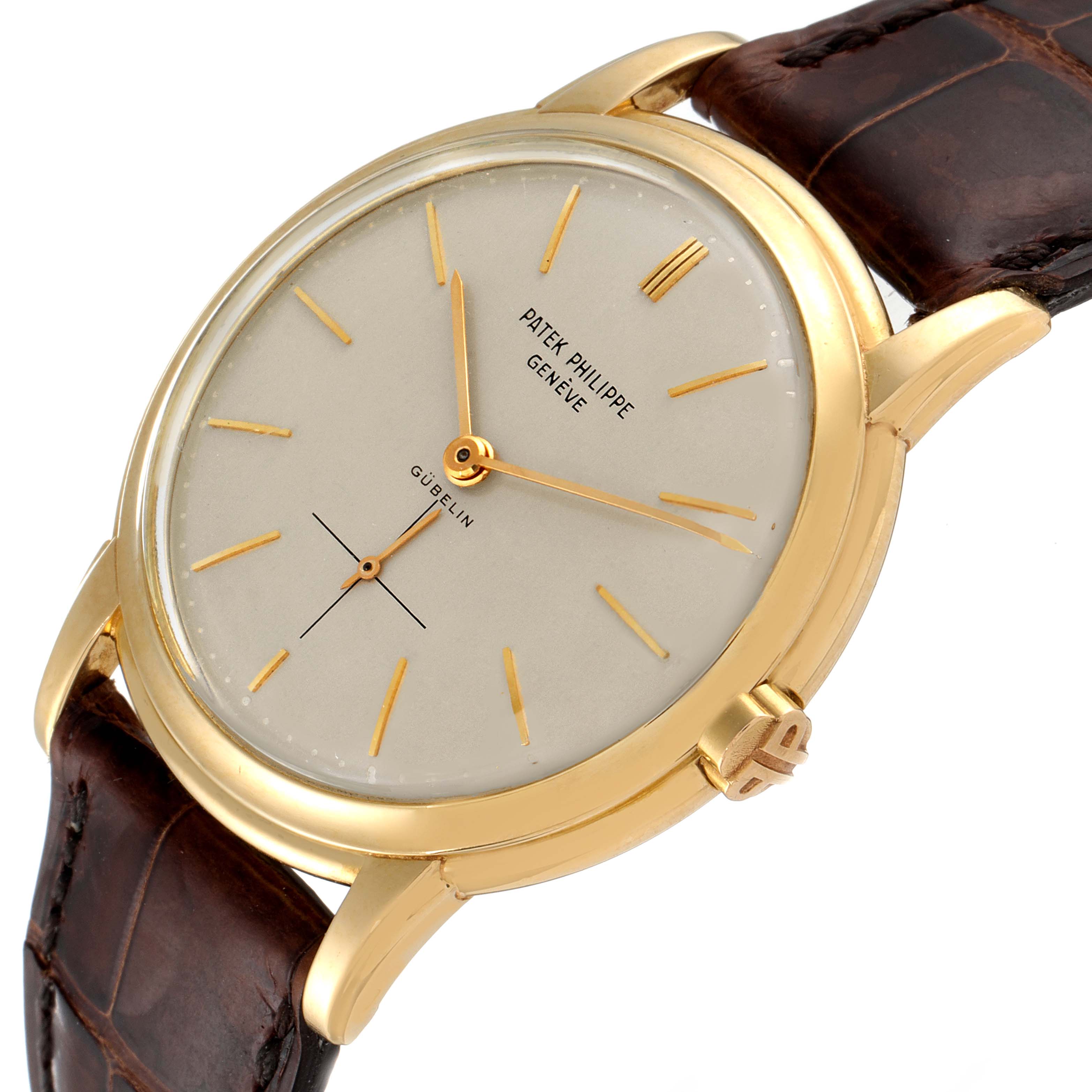 The image shows the Patek Philippe Calatrava 2551J Men's Yellow Gold Silver Dial 2551J Men's Yellow Gold Silver Dial watch at a slight angle, displaying the dial, case, and a portion of the leather strap.
