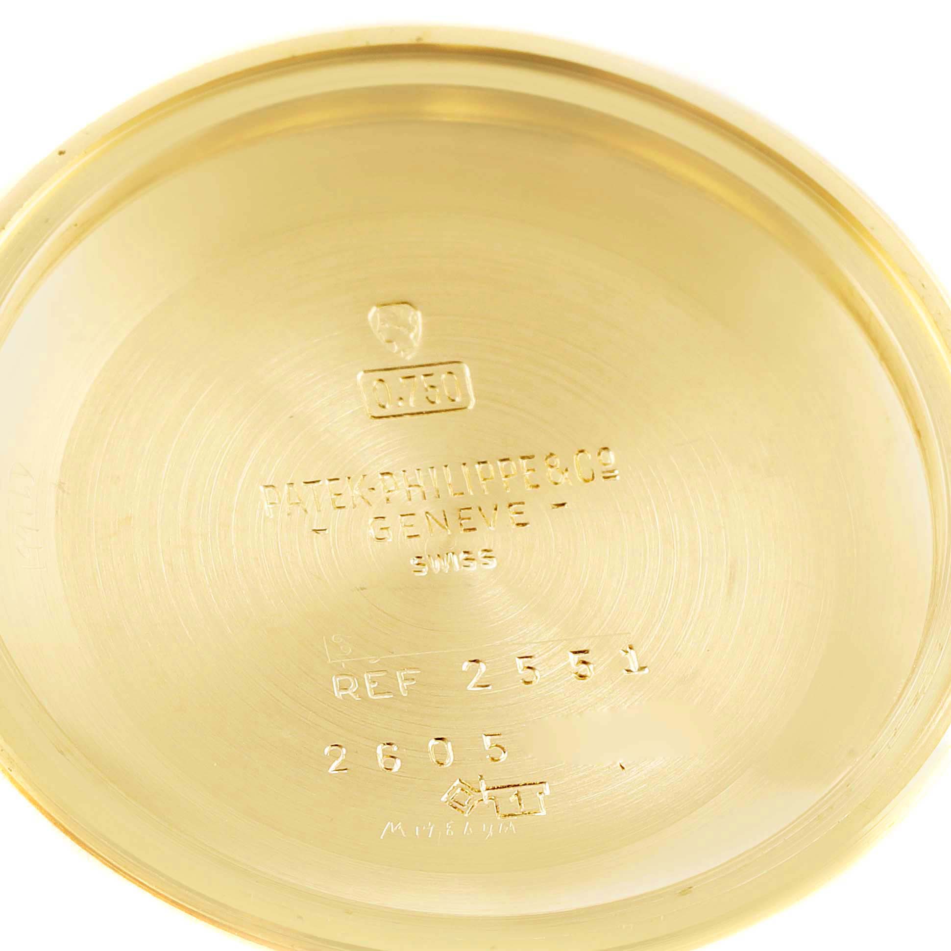 This image shows the inside of the case back of the Patek Philippe Calatrava 2551J Men's Yellow Gold Silver Dial 2551J Men's Yellow Gold Silver Dial watch, displaying its model reference and hallmarking.