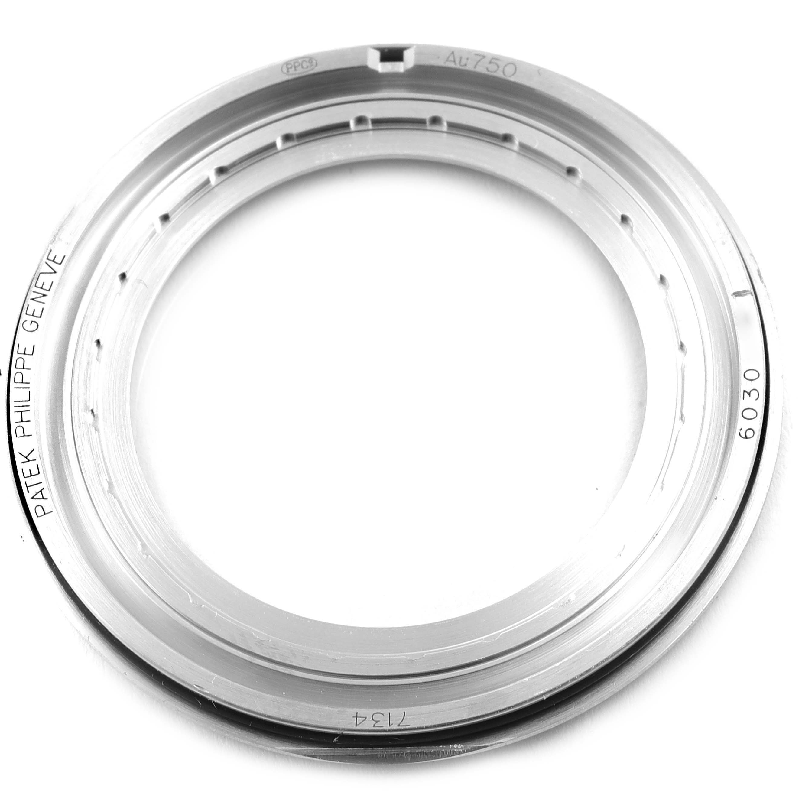 This image shows the bezel ring from a Patek Philippe Calatrava 7134G-001 Men's White Gold Brown Dial 7134G-001 Men's White Gold Brown Dial watch, viewed from above.