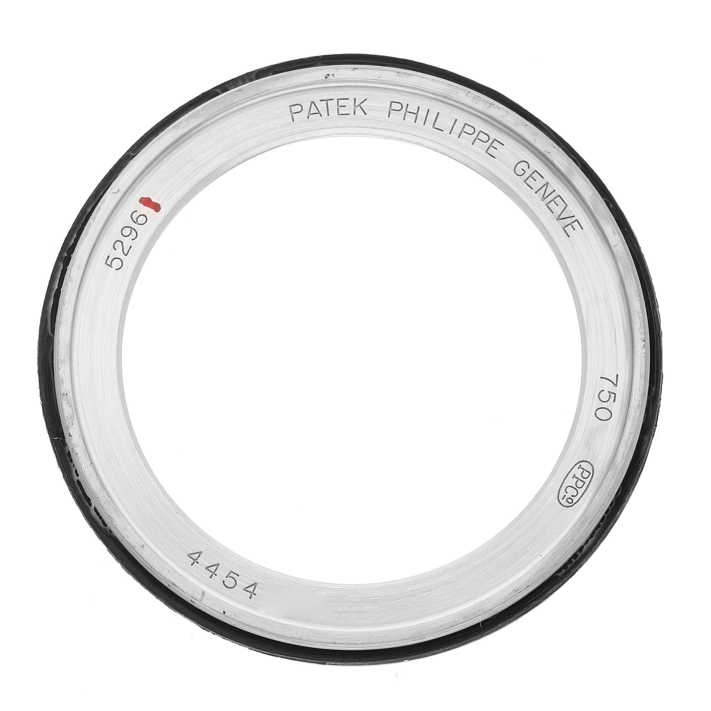 This image shows the bezel part of a Patek Philippe Calatrava 5296G Men
s White Gold Silver Dial 5296G Men
s White Gold Silver Dial model watch from a top-down angle.