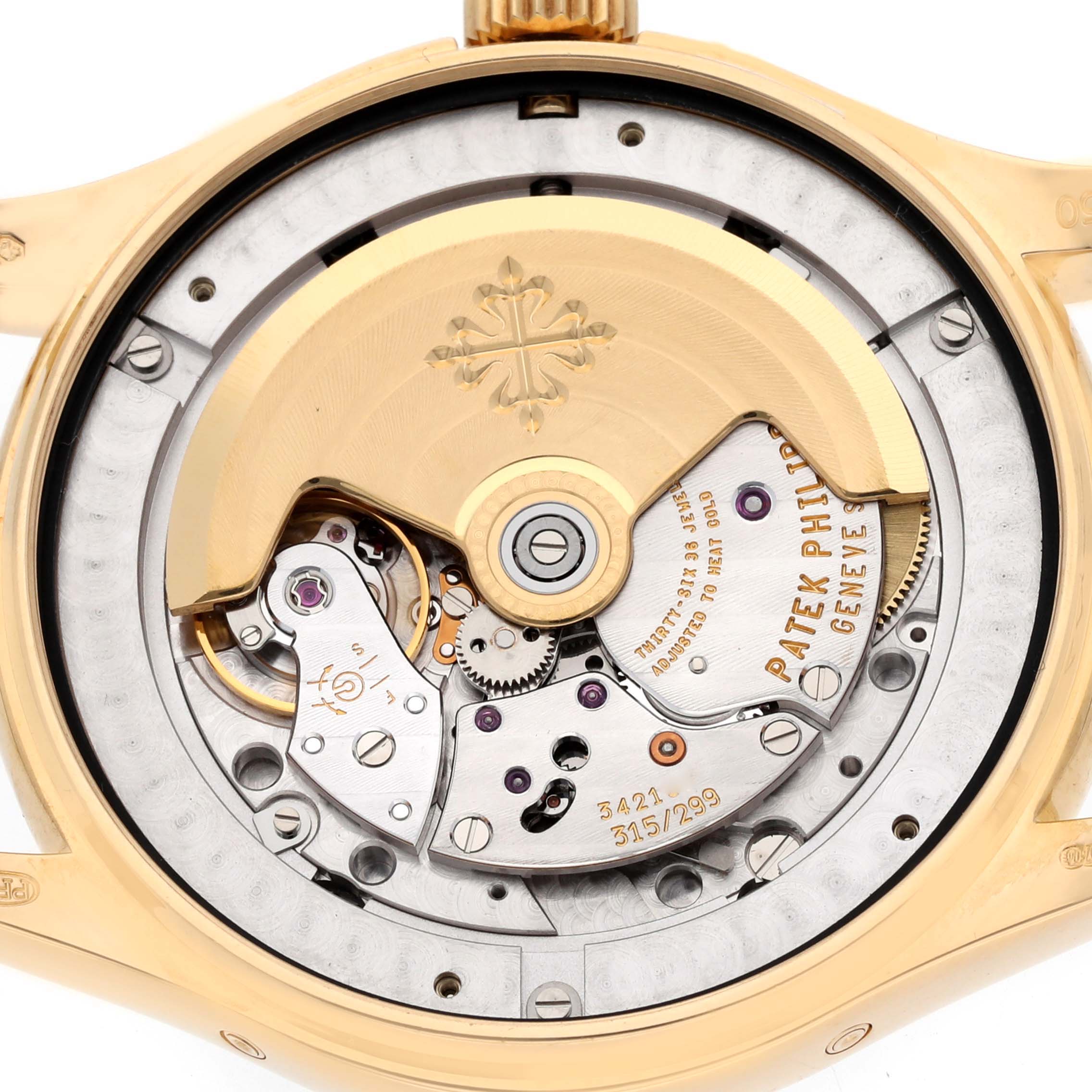 The image shows the detailed internal mechanisms of the Patek Philippe Complications 5146J-010 Men's Yellow Gold Grey Dial 5146J-010 Men's Yellow Gold Grey Dial model from the back angle.