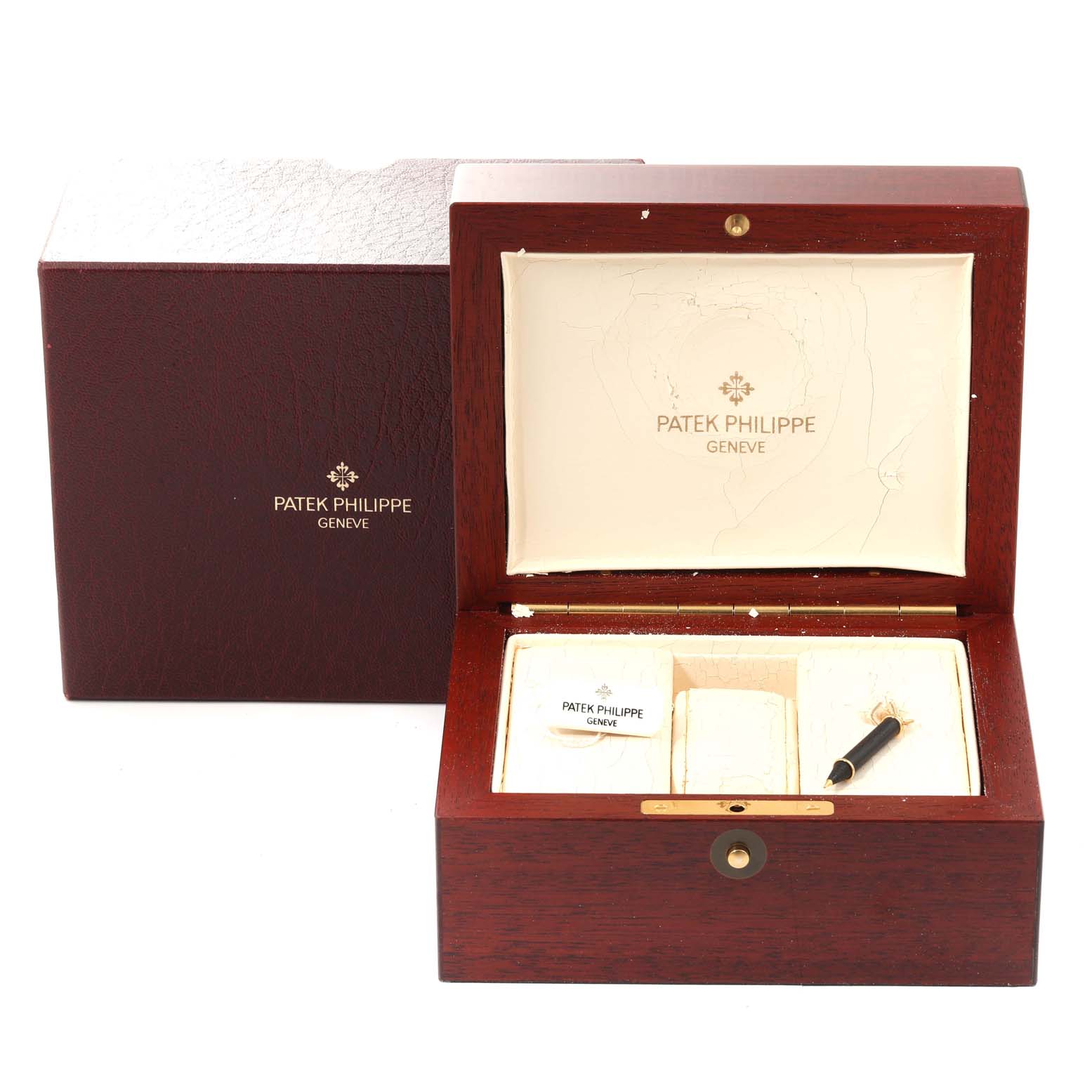 This image shows the open presentation box and packaging for a Patek Philippe Complications 5146J-010 Men's Yellow Gold Grey Dial 5146J-010 Men's Yellow Gold Grey Dial model watch, including compartments for accessories.