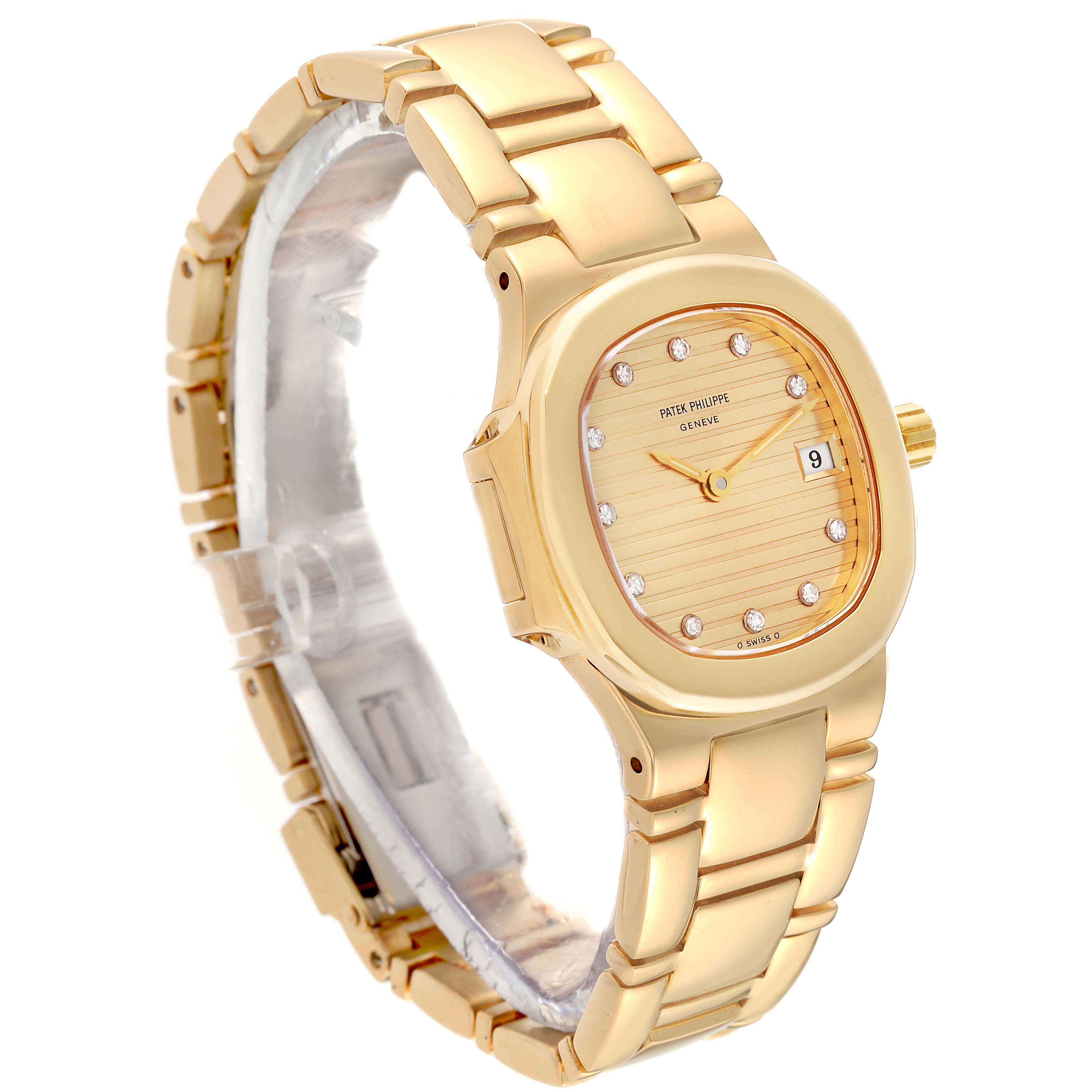 This image shows a side angle of a Patek Philippe Nautilus 4700/51 Women's Yellow Gold Champagne Dial 4700/51 Women's Yellow Gold Champagne Dial watch, highlighting its gold bracelet, case, and dial with a date display.