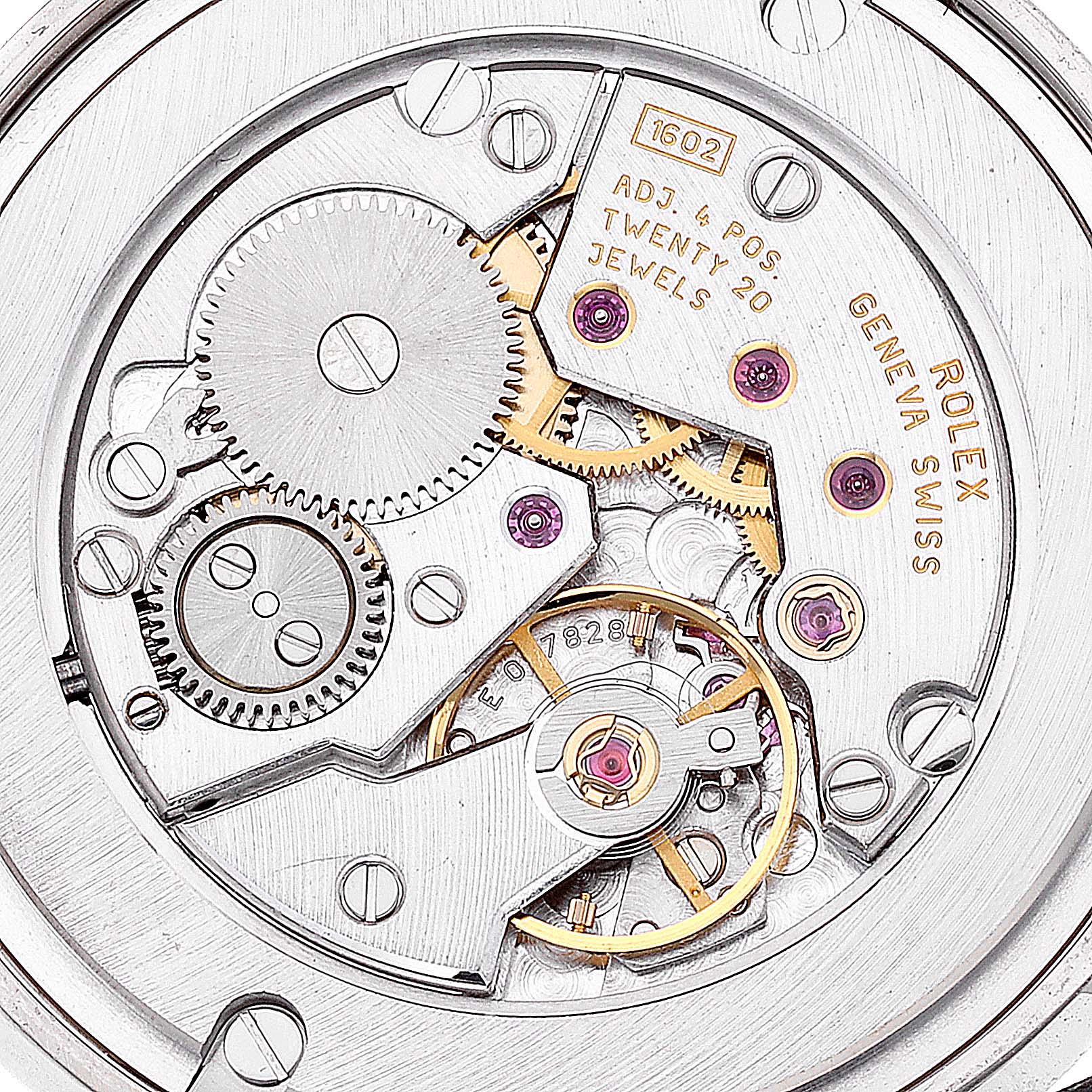 This close-up image shows the intricate inner mechanics of a Rolex Cellini 5116 Men's White Gold Silver Dial 5116 Men's White Gold Silver Dial watch, highlighting gears and jewel bearings.