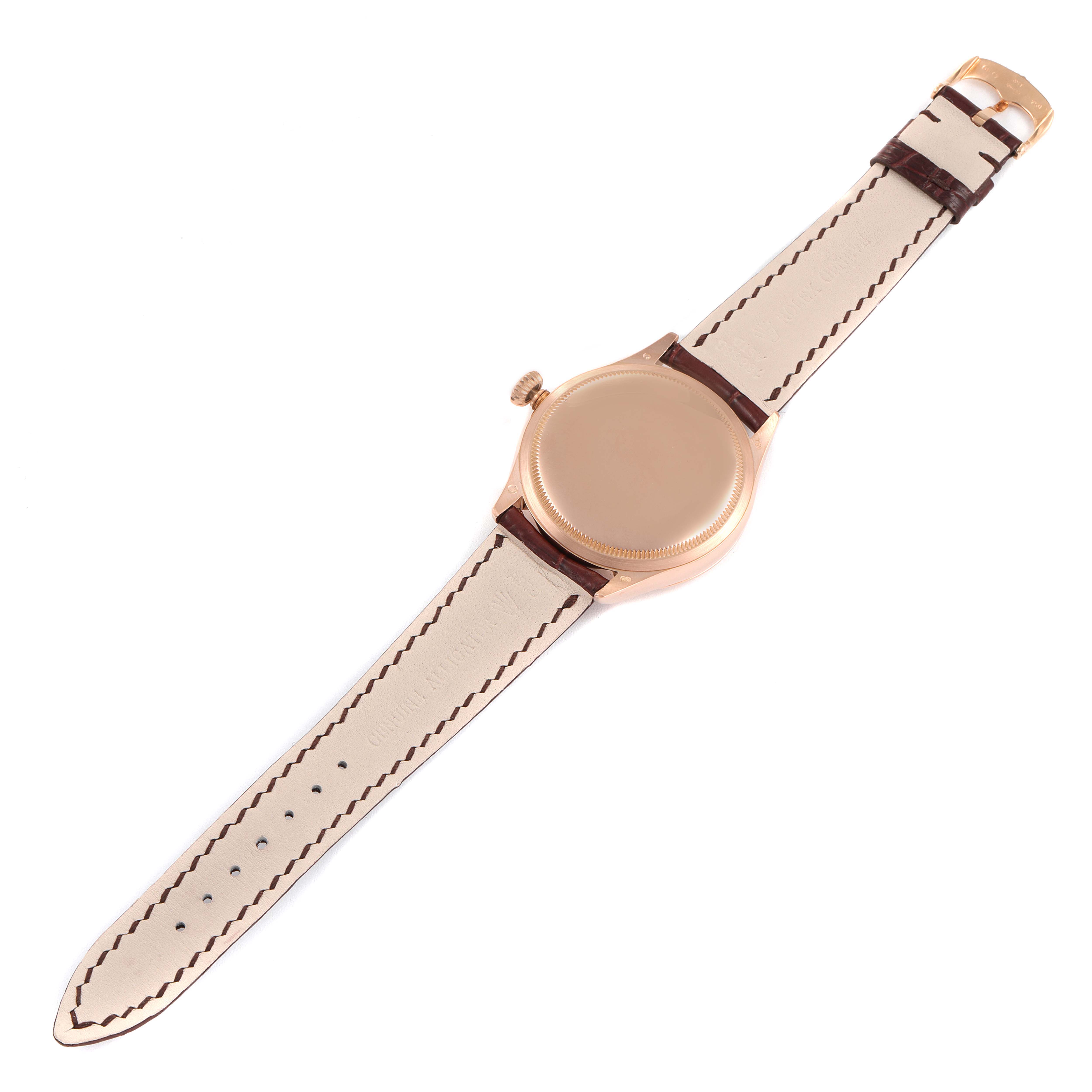 This Rolex Cellini 50505 Men's Rose Gold White Dial 50505 Men's Rose Gold White Dial watch is photographed from the back, showing the strap, buckle, and case back.