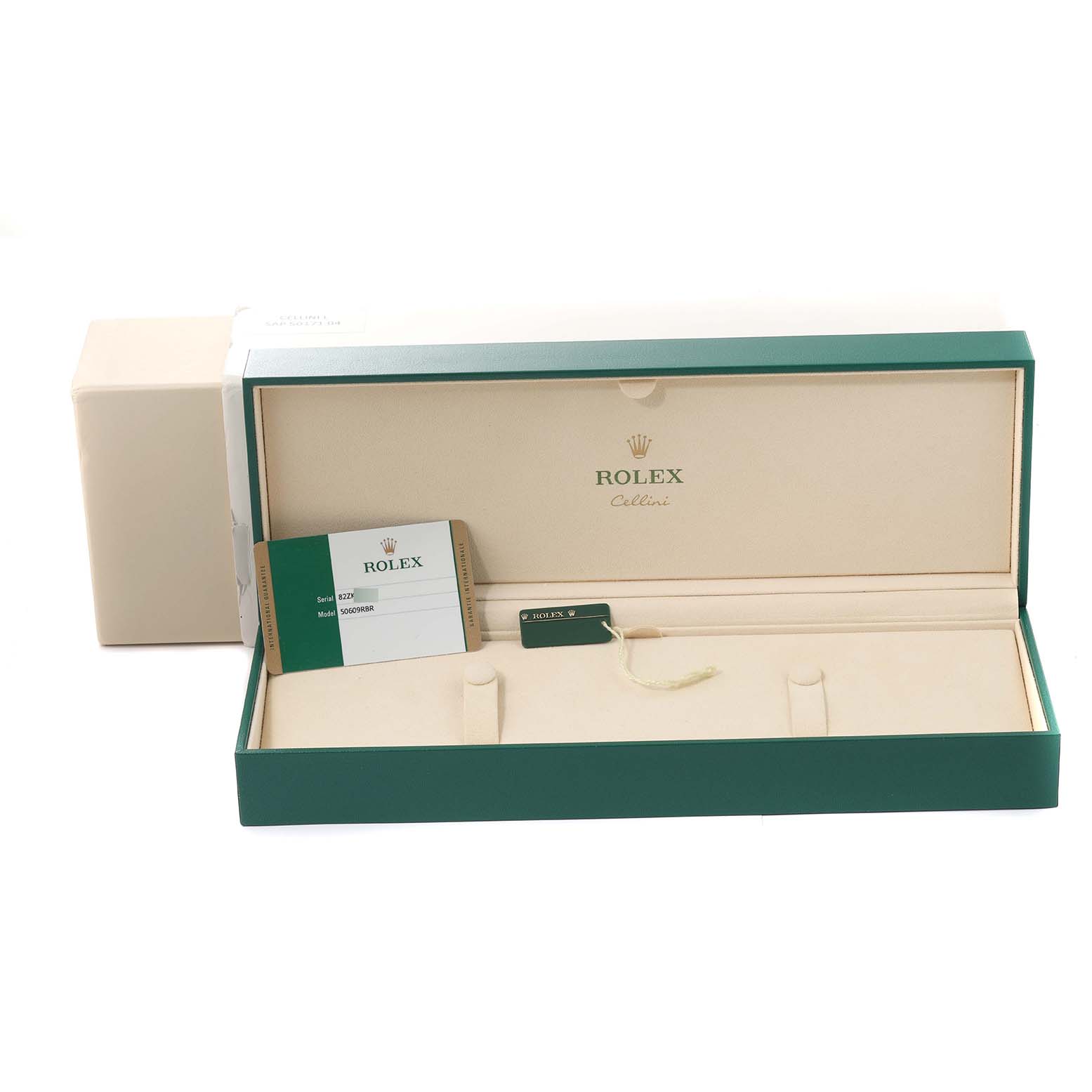 A Rolex Cellini 50609RBR Men's White Gold Black Dial 50609RBR Men's White Gold Black Dial watch box is shown, including a warranty card and tag, viewed from a slightly elevated front angle.