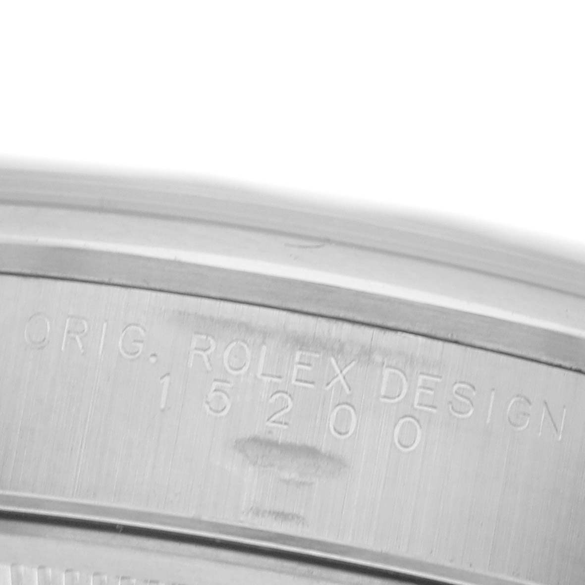 The image shows a close-up of the engraved reference number on the case edge of a Rolex Date 15200 Men's Stainless Steel Black Dial 15200 Men's Stainless Steel Black Dial model.
