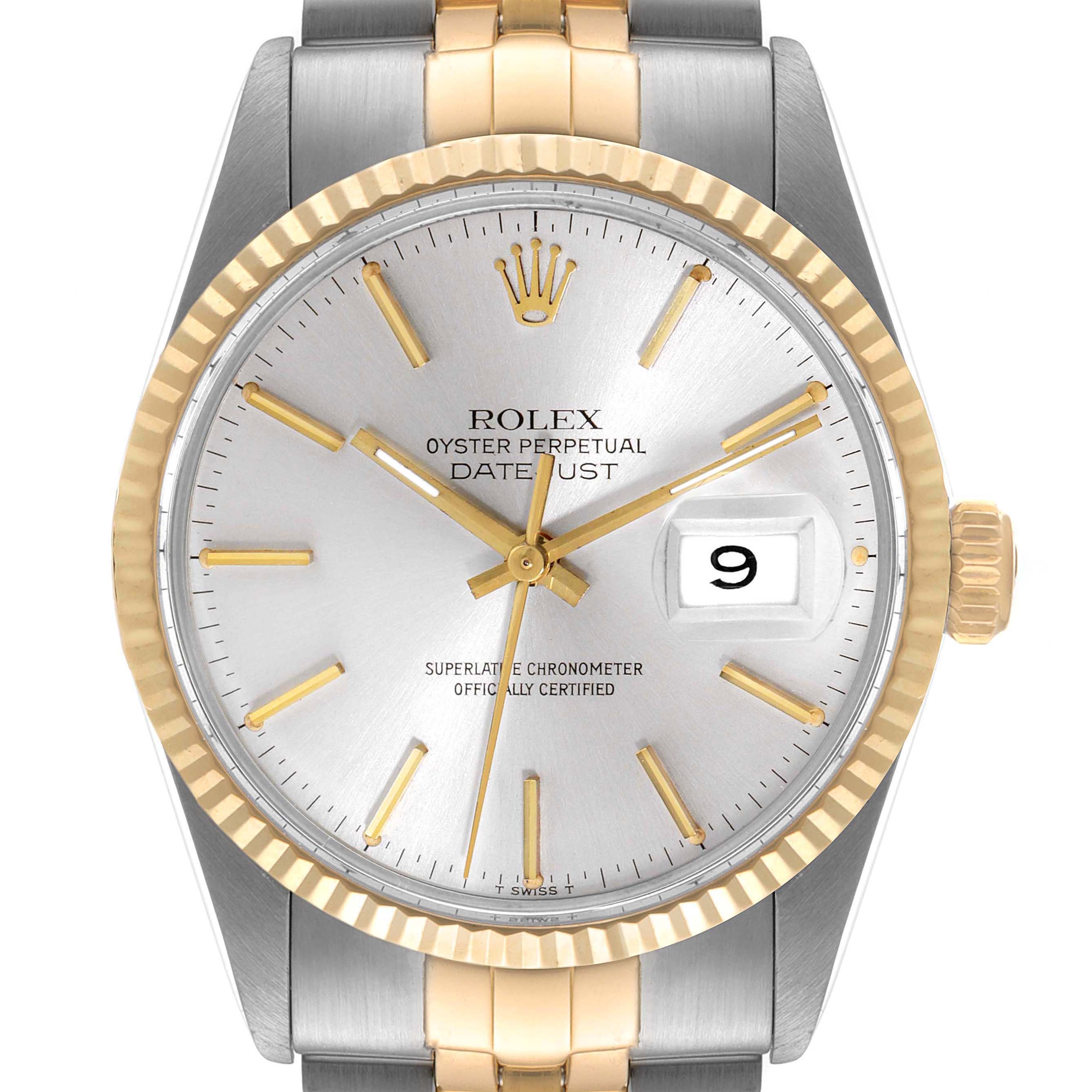 This is a close-up of the face of a Rolex Vintage Collection 16013 Men's Steel and Gold (two tone) Silver Dial 16013 Men's Steel and Gold (two tone) Silver Dial Oyster Perpetual Datejust watch, showing the dial, hands, date window, and crown.