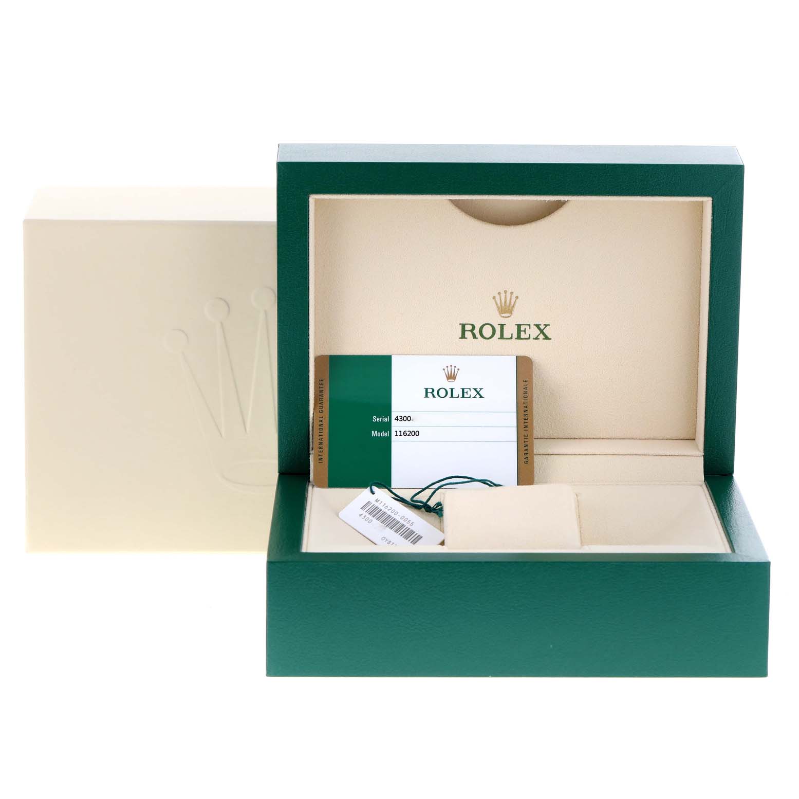 This image shows the open box and accessories of a Rolex Datejust 116200 Men's Stainless Steel White Dial 116200 Men's Stainless Steel White Dial watch, including the warranty card.