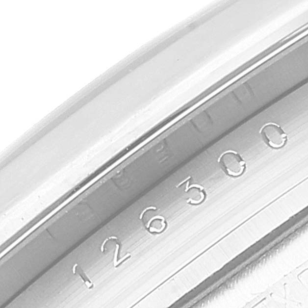 This close-up angle of the Rolex Datejust 41 126300 Men's Stainless Steel Blue Dial 126300 Men's Stainless Steel Blue Dial shows the model number engraved on the inner bezel.