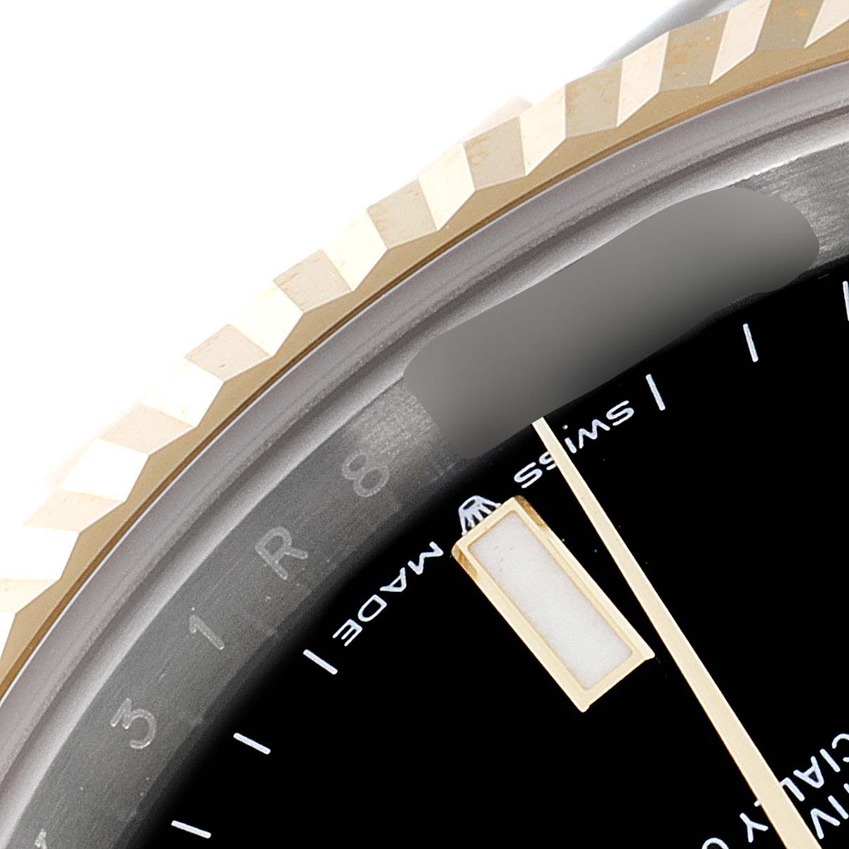 The image shows a close-up of the bezel and part of the dial of a Rolex Datejust 41 126333 Men's Steel and Gold (two tone) Black Dial 126333 Men's Steel and Gold (two tone) Black Dial watch.