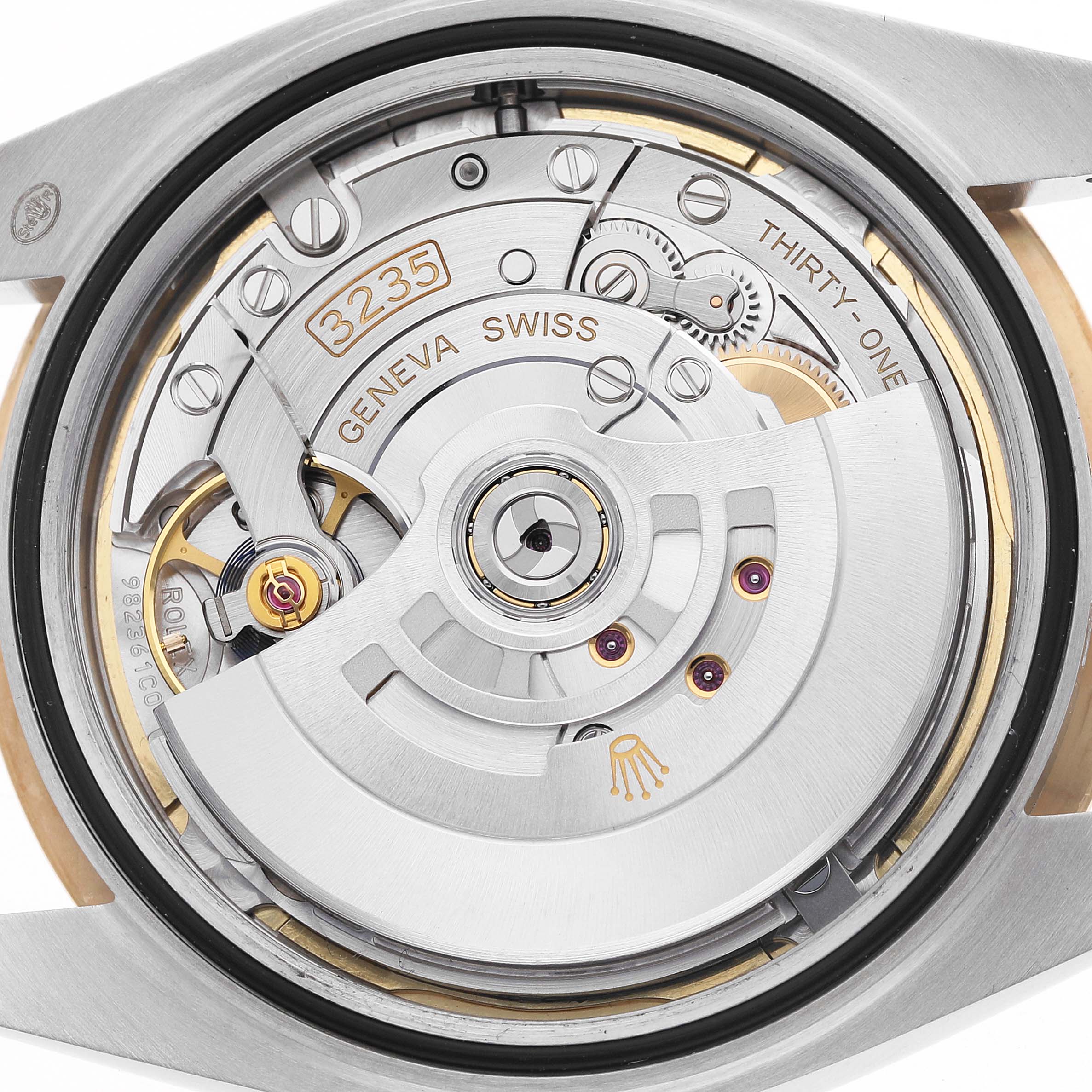The image shows the back view of a Rolex Datejust 41 126333 Men's Steel and Gold (two tone) Champagne Dial, highlighting the movement mechanism and rotor details.