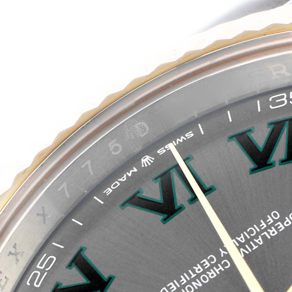 The image shows a close-up angle of the Rolex Datejust 41 126333 Men's Steel and Gold (two tone) Grey Dial 126333 Men's Steel and Gold (two tone) Grey Dial watch face, highlighting the bezel and Roman numerals.
