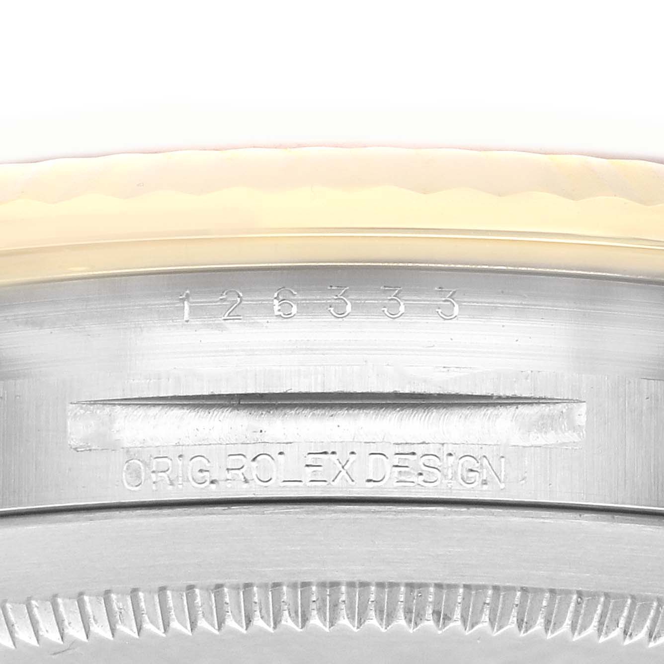 The image shows a close-up of the side engraving on the case of a Rolex Datejust 41 126333 Men's Steel and Gold (two tone) Grey Dial 126333 Men's Steel and Gold (two tone) Grey Dial watch, displaying the model number and "ORIG ROLEX DESIGN."