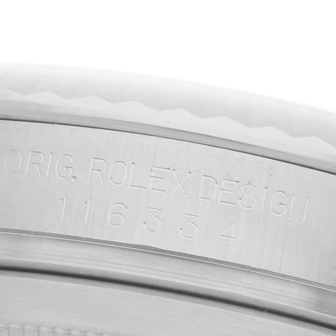 The image shows a close-up of the watch
s inner bezel, featuring "Rolex" and model number engraving on the Datejust 41.