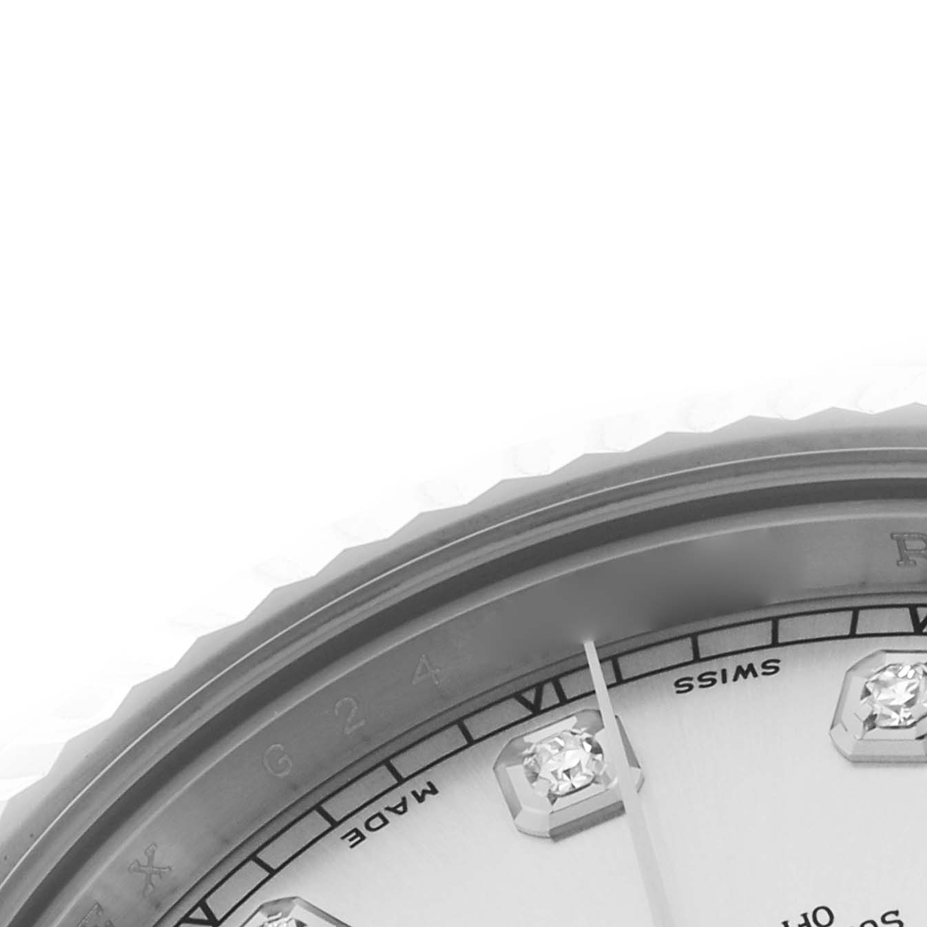The image shows a close-up of the Rolex Datejust 41 116334 Men
s Stainless Steel Silver Dial 116334 Men
s Stainless Steel Silver Dial face, featuring the bezel, part of the dial, and diamond hour markers.