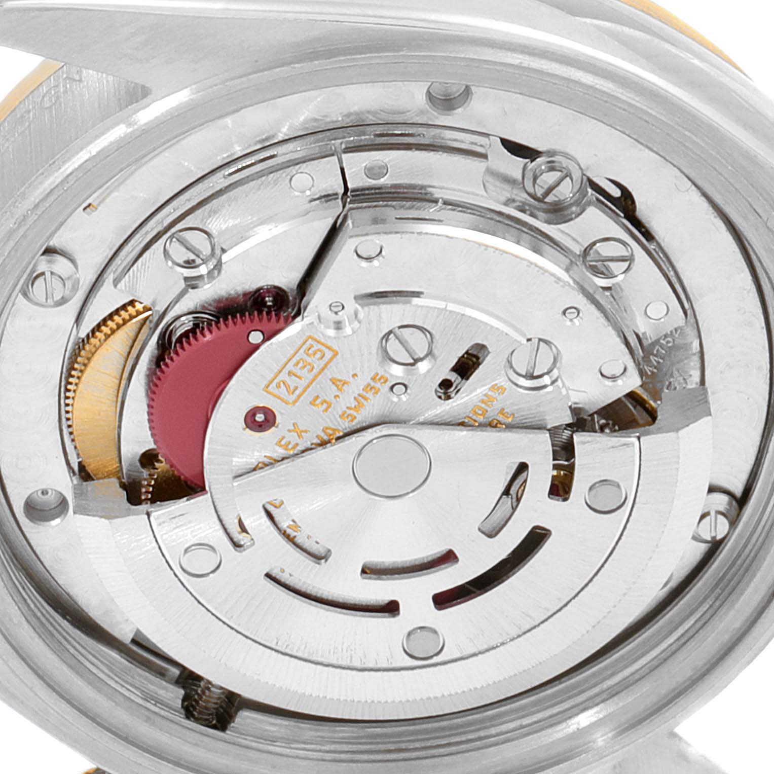 The image shows a close-up angle of the movement and internal mechanism of a Rolex Mid-Size 68273 Women
s Steel and Gold (two tone) Champagne Dial 68273 Women
s Steel and Gold (two tone) Champagne Dial watch.