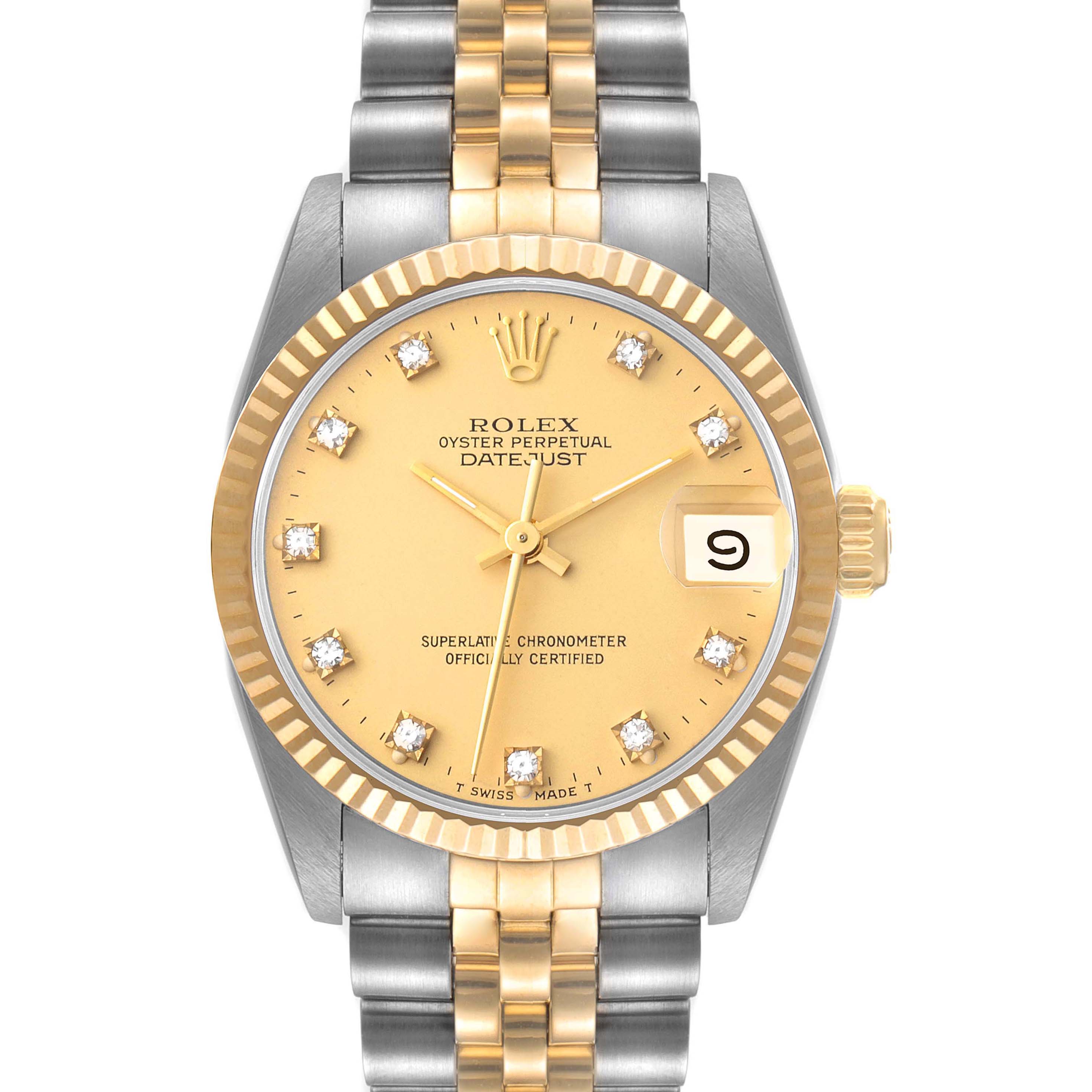 The Rolex Mid-Size 68273 Women
s Steel and Gold (two tone) Champagne Dial 68273 Women
s Steel and Gold (two tone) Champagne Dial Datejust watch is shown from a front angle, displaying the dial, bezel, crown, and bracelet.