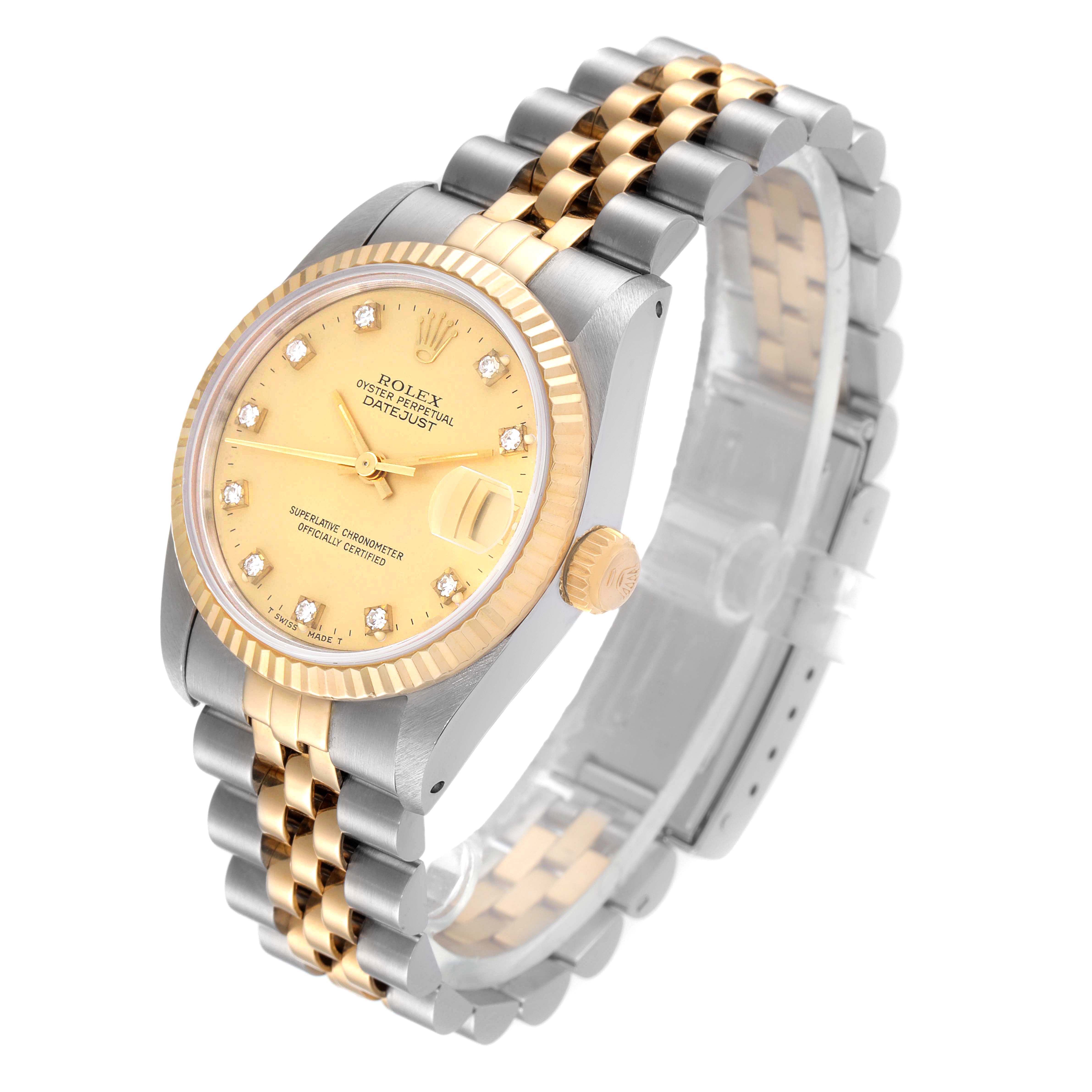 This image shows a side-angle view of a Rolex Mid-Size 68273 Women
s Steel and Gold (two tone) Champagne Dial 68273 Women
s Steel and Gold (two tone) Champagne Dial Datejust watch with a gold and silver jubilee bracelet.