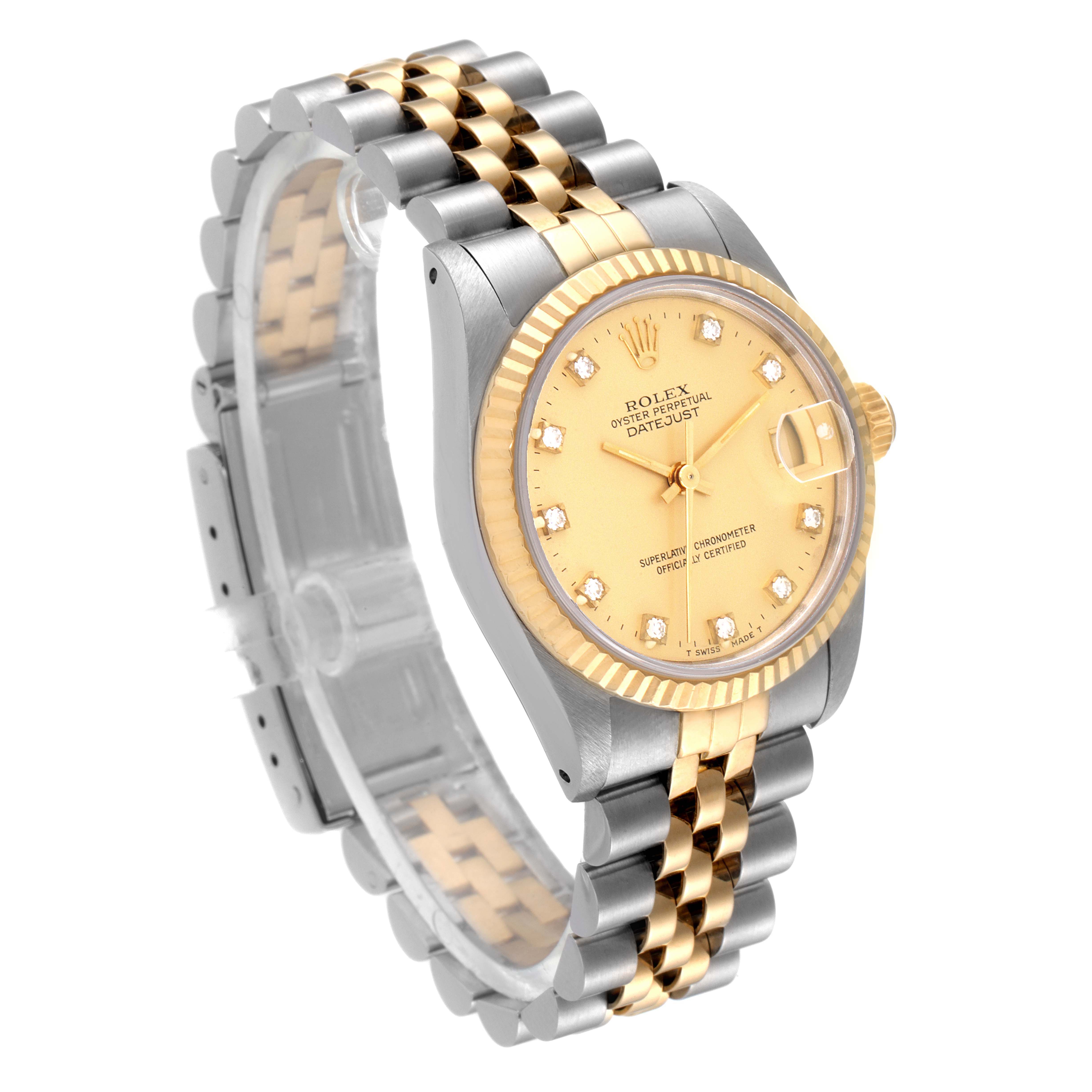 This image shows a Rolex Mid-Size 68273 Women
s Steel and Gold (two tone) Champagne Dial 68273 Women
s Steel and Gold (two tone) Champagne Dial Datejust watch, featuring its face, bezel, and two-tone bracelet, taken from a front-side angle.