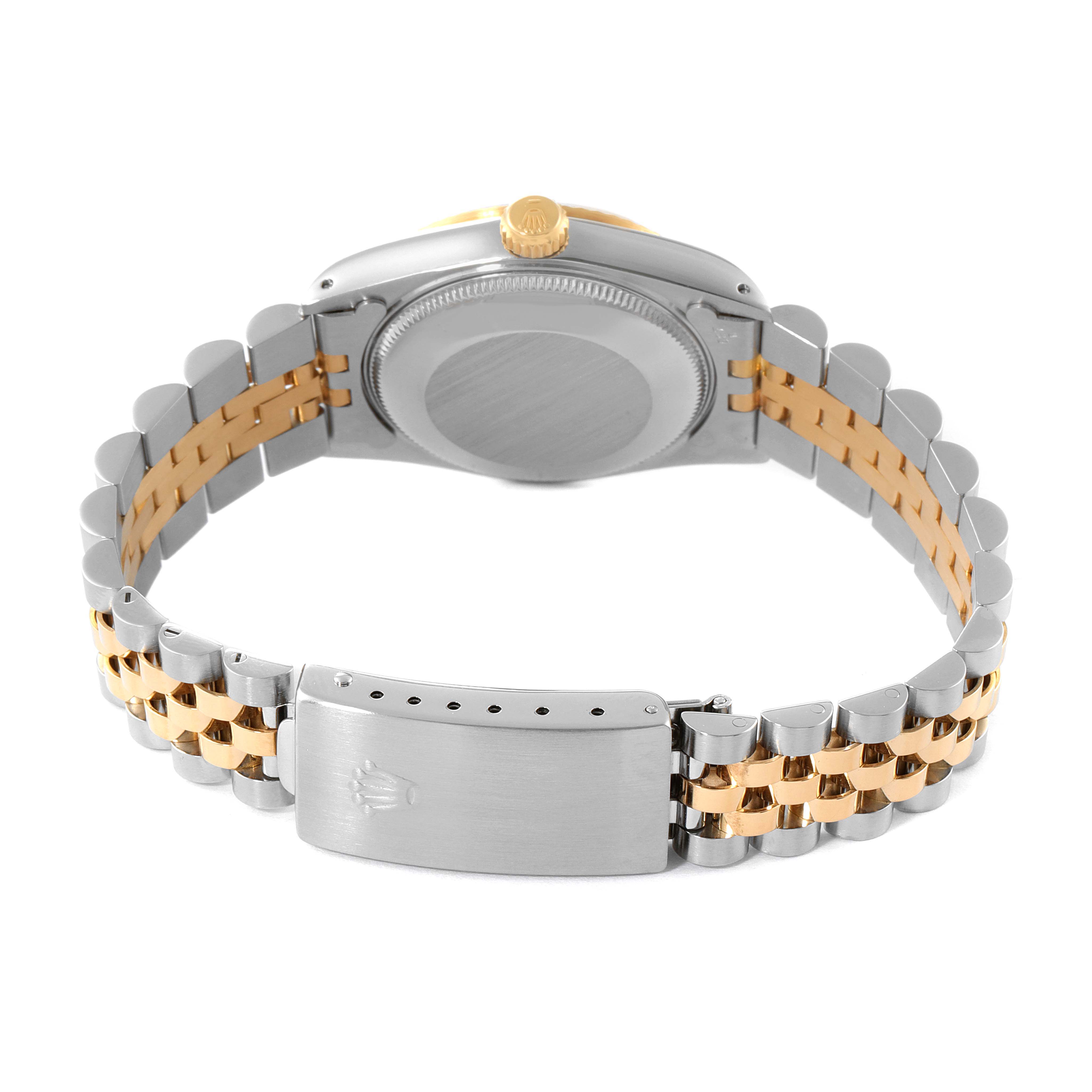 The image shows the back case and bracelet clasp of a Rolex Mid-Size 68273 Women
s Steel and Gold (two tone) Champagne Dial 68273 Women
s Steel and Gold (two tone) Champagne Dial model watch.