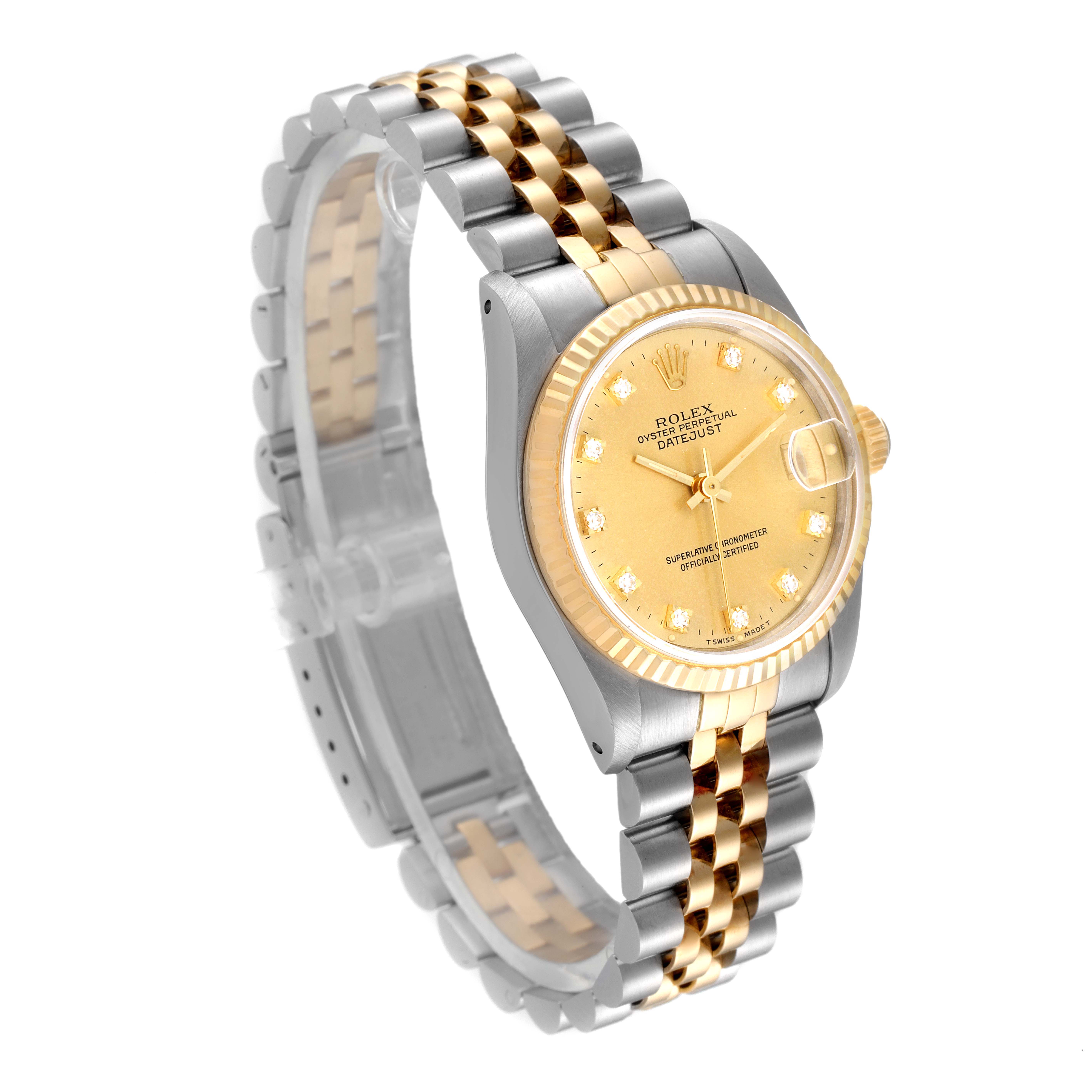 The Rolex Mid-Size 68273 Women
s Steel and Gold (two tone) Champagne Dial 68273 Women
s Steel and Gold (two tone) Champagne Dial model is shown at a 3/4 angle, highlighting the gold dial, fluted bezel, and two-tone Jubilee bracelet.