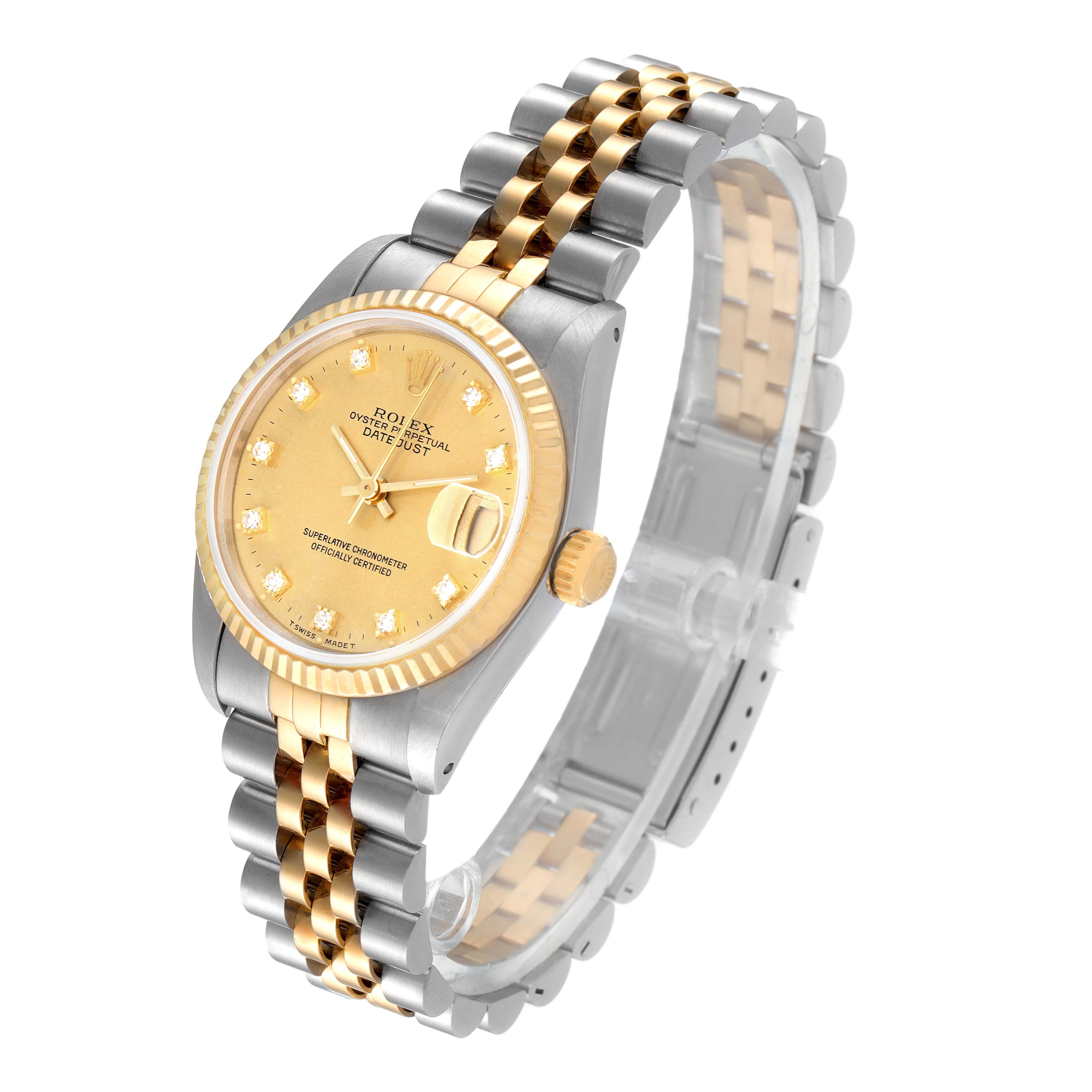 This image shows a Rolex Mid-Size 68273 Women
s Steel and Gold (two tone) Champagne Dial 68273 Women
s Steel and Gold (two tone) Champagne Dial Datejust watch from an angled top view, highlighting the two-tone bracelet and diamond-set champagne dial.