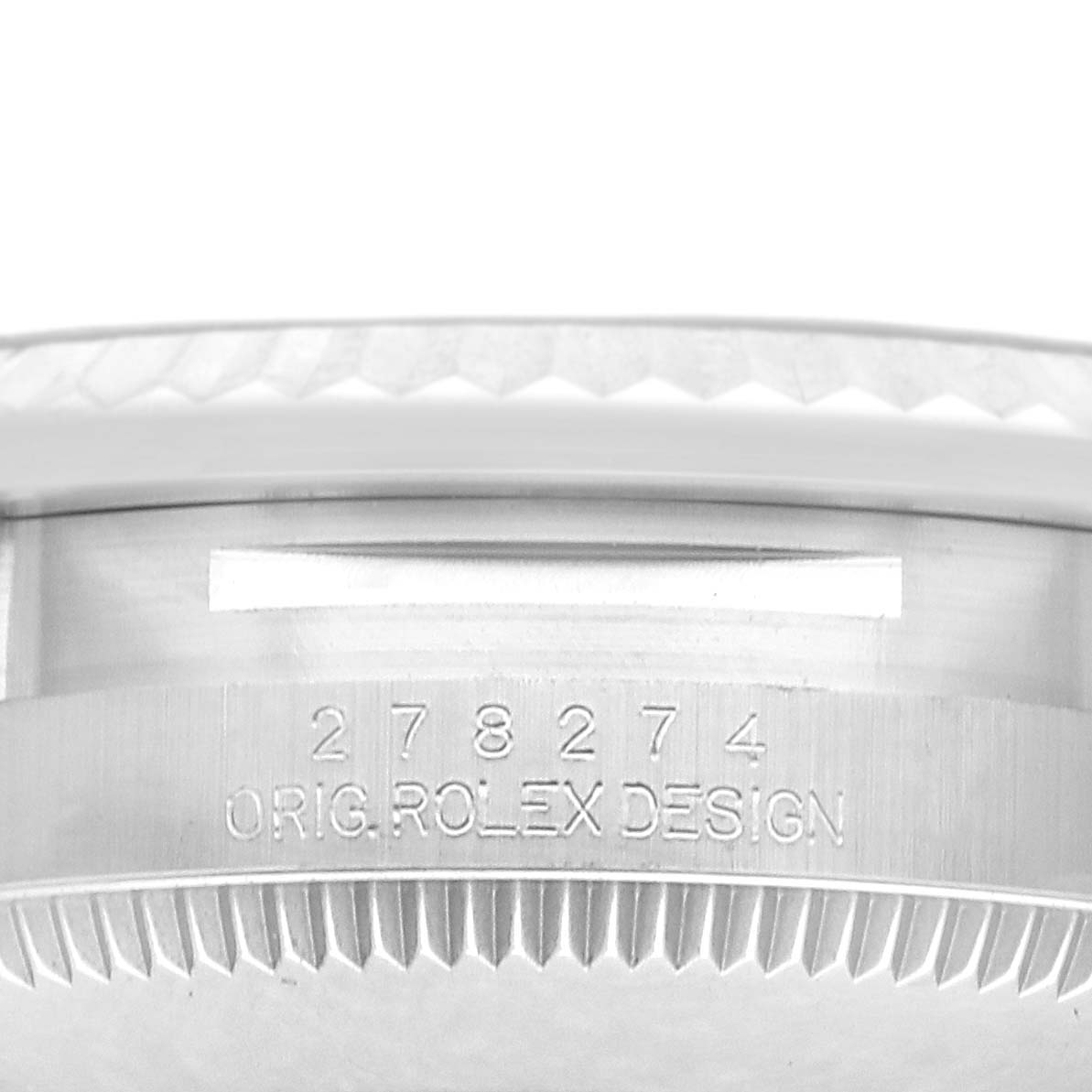 The image shows the side view of a Rolex Mid-Size 278274 Women
s Stainless Steel Blue Dial 278274 Women
s Stainless Steel Blue Dial watch, highlighting the engraved serial number and design details.