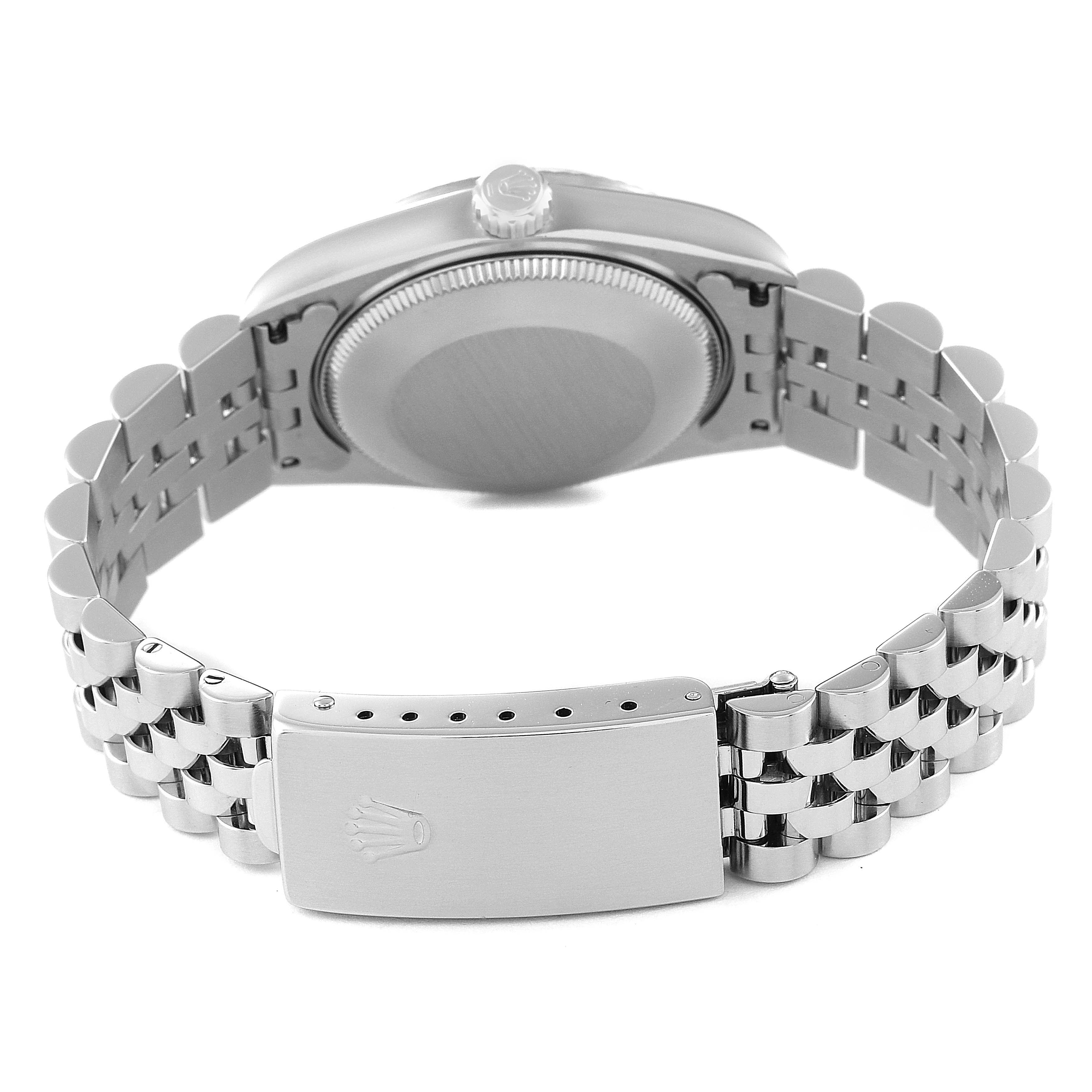 This image shows the case back, clasp, and bracelet of a Mid-Size Rolex watch from a rear angle.