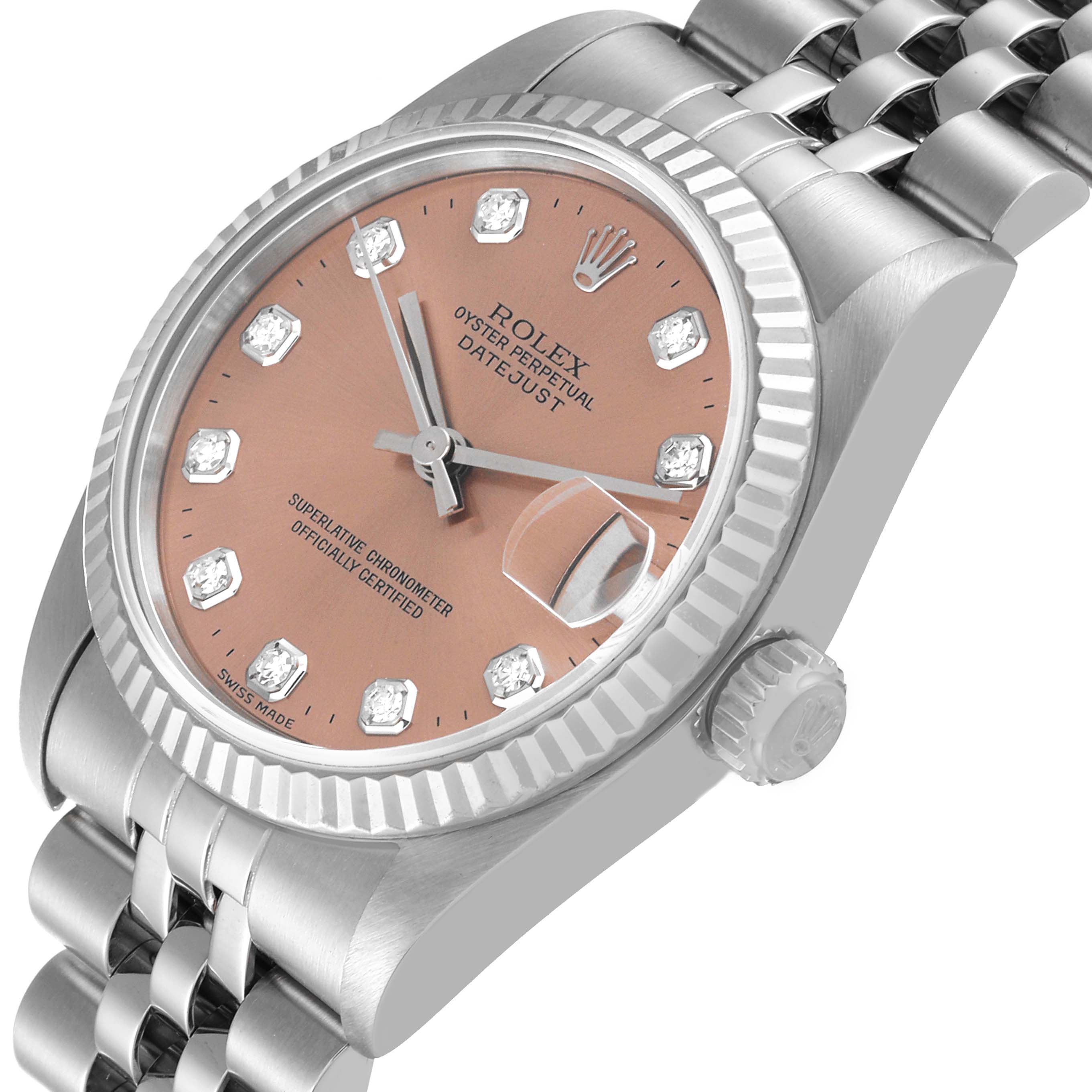 The image shows a close-up angle of a Rolex Mid-Size 68274 Women
s Stainless Steel Pink Dial 68274 Women
s Stainless Steel Pink Dial Datejust watch, featuring its dial, bezel, crown, and part of the bracelet.