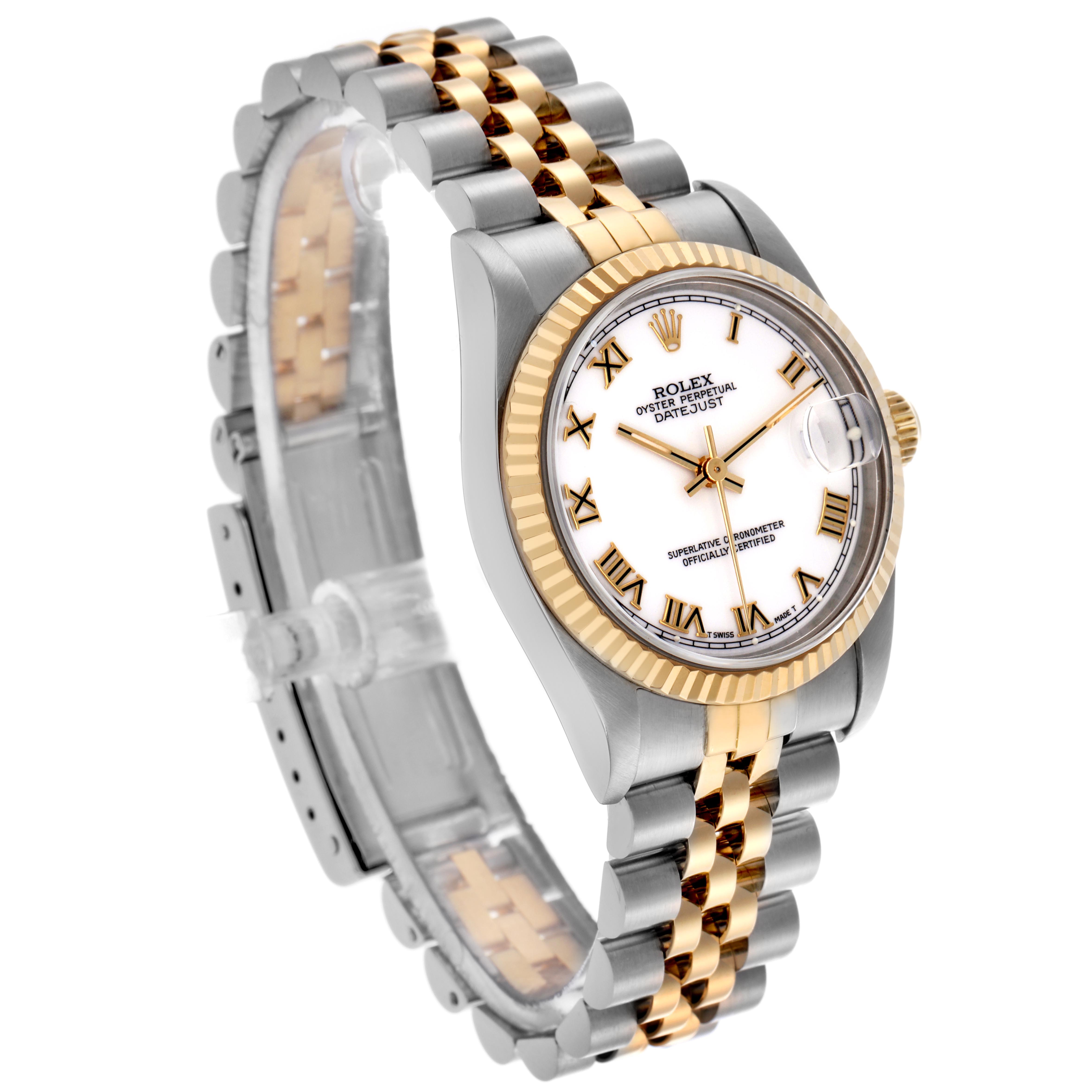 The Rolex Mid-Size 68273 Women's Steel and Gold (two tone) White Dial 68273 Women's Steel and Gold (two tone) White Dial watch is shown in a three-quarter view highlighting the gold and silver bracelet, bezel, and white dial.