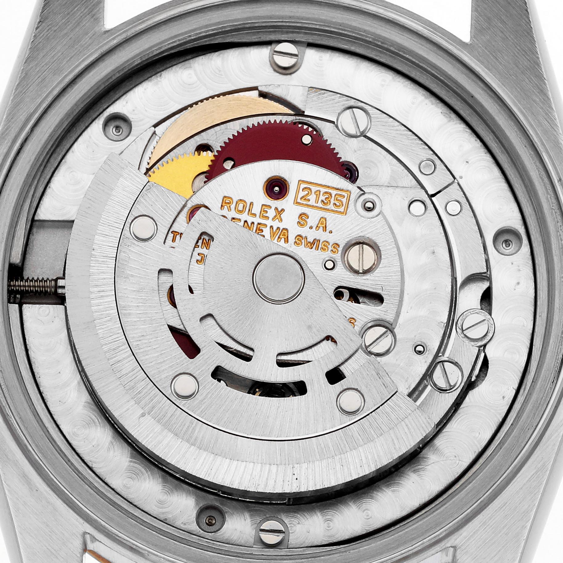 The image shows the movement of a Rolex Mid-Size 68273 Women's Steel and Gold (two tone) White Dial 68273 Women's Steel and Gold (two tone) White Dial watch, viewed from the back, highlighting gears and the rotor.