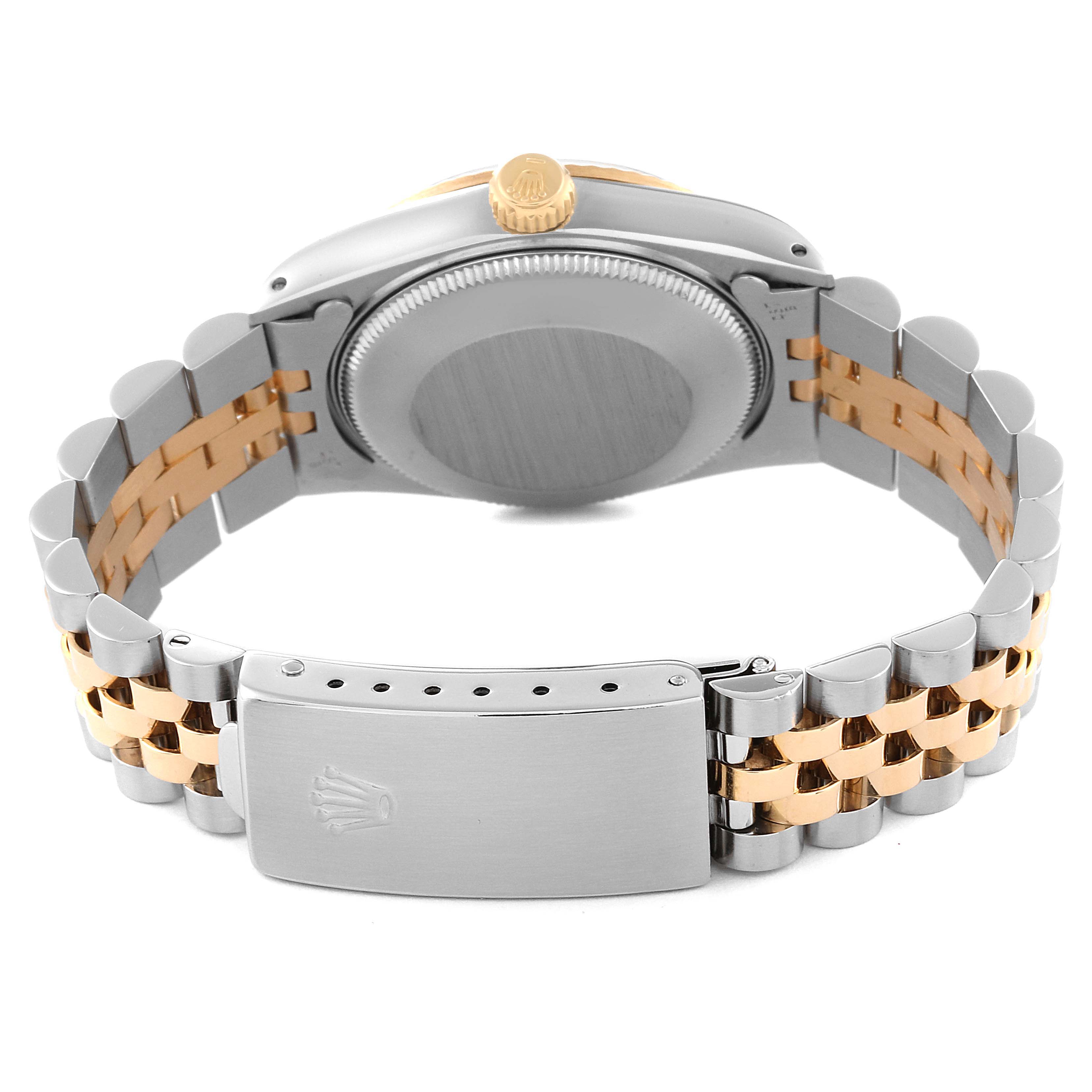 This image shows the back case, crown, and bracelet clasp of a Rolex Mid-Size 68273 Women's Steel and Gold (two tone) Champagne Dial 68273 Women's Steel and Gold (two tone) Champagne Dial watch at a rear angle.