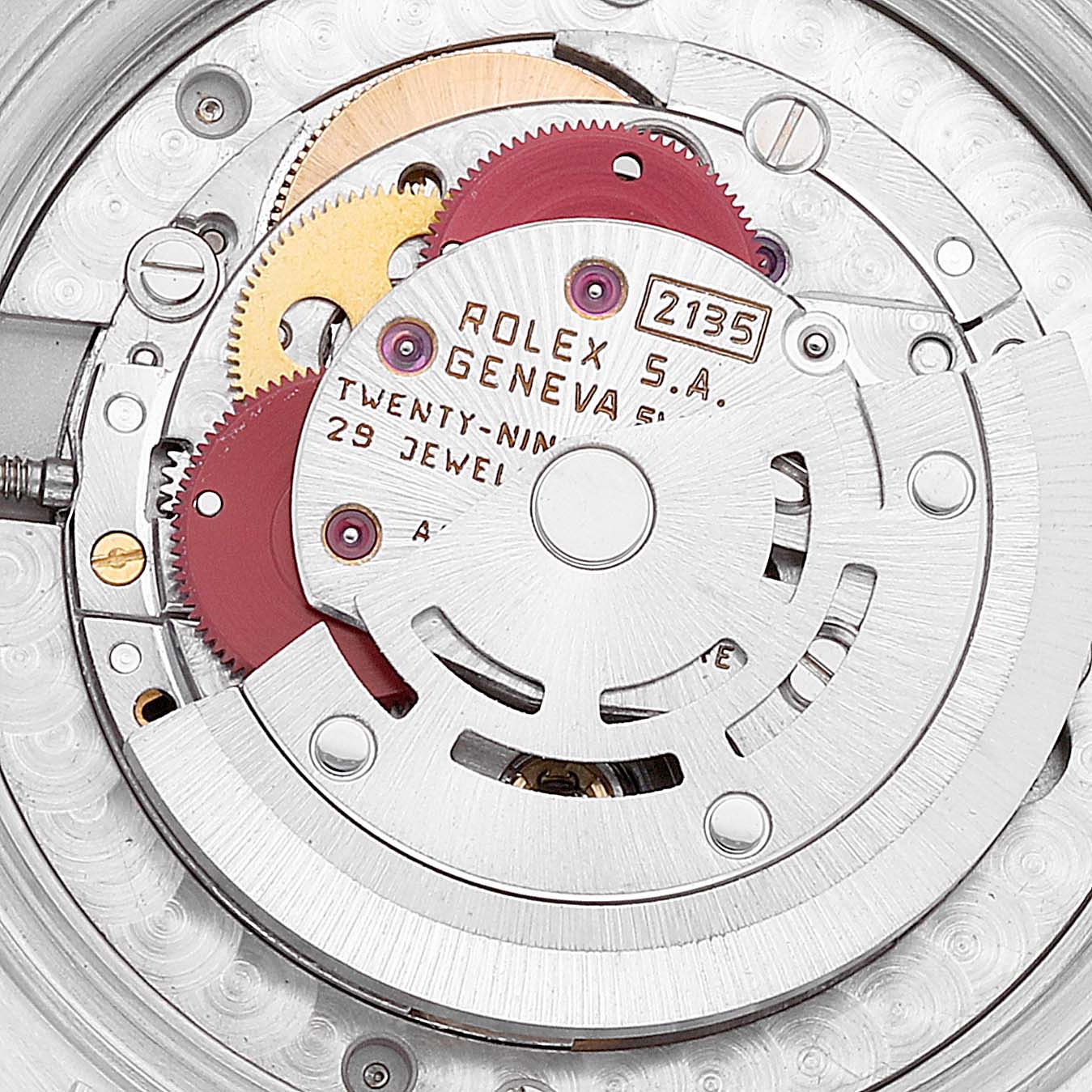 The image shows an internal view of the Rolex Mid-Size 68273 Women's Steel and Gold (two tone) Champagne Dial 68273 Women's Steel and Gold (two tone) Champagne Dial model watch, highlighting the intricate movement and gear mechanism.