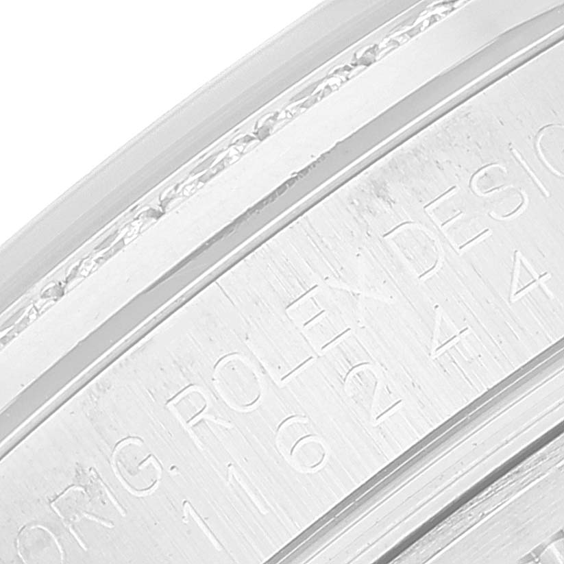This close-up image shows the engraved caseback of a Rolex Datejust 116244 Men's Stainless Steel Mother of Pearl Dial 116244 Men's Stainless Steel Mother of Pearl Dial model, highlighting its model number and details.