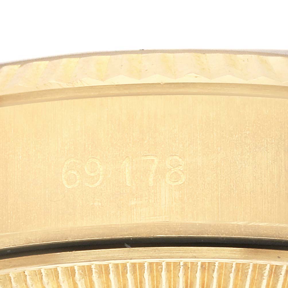 This is a close-up angle showing the model number engraved on the side of a Rolex President 69178 Women's Yellow Gold White Dial 69178 Women's Yellow Gold White Dial watch case.
