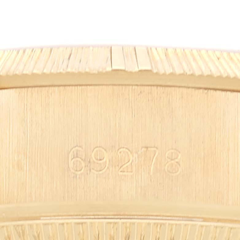 This image shows a close-up of the model number "69278" engraved on the case side of a Rolex President 69278 Women
s Yellow Gold Champagne Dial 69278 Women
s Yellow Gold Champagne Dial watch.