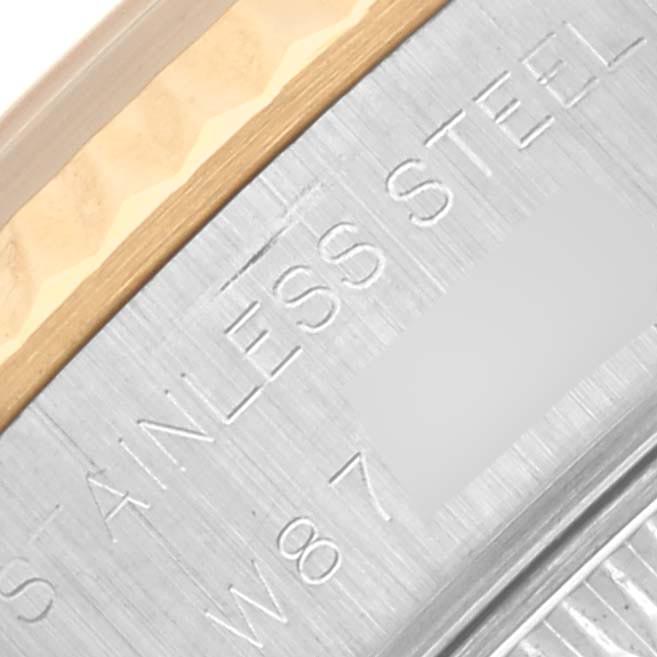 The image shows a close-up of the side of a Rolex Datejust 69173 Women's Steel and Gold (two tone) Beige Dial 69173 Women's Steel and Gold (two tone) Beige Dial, highlighting the stainless steel and part of the bezel.