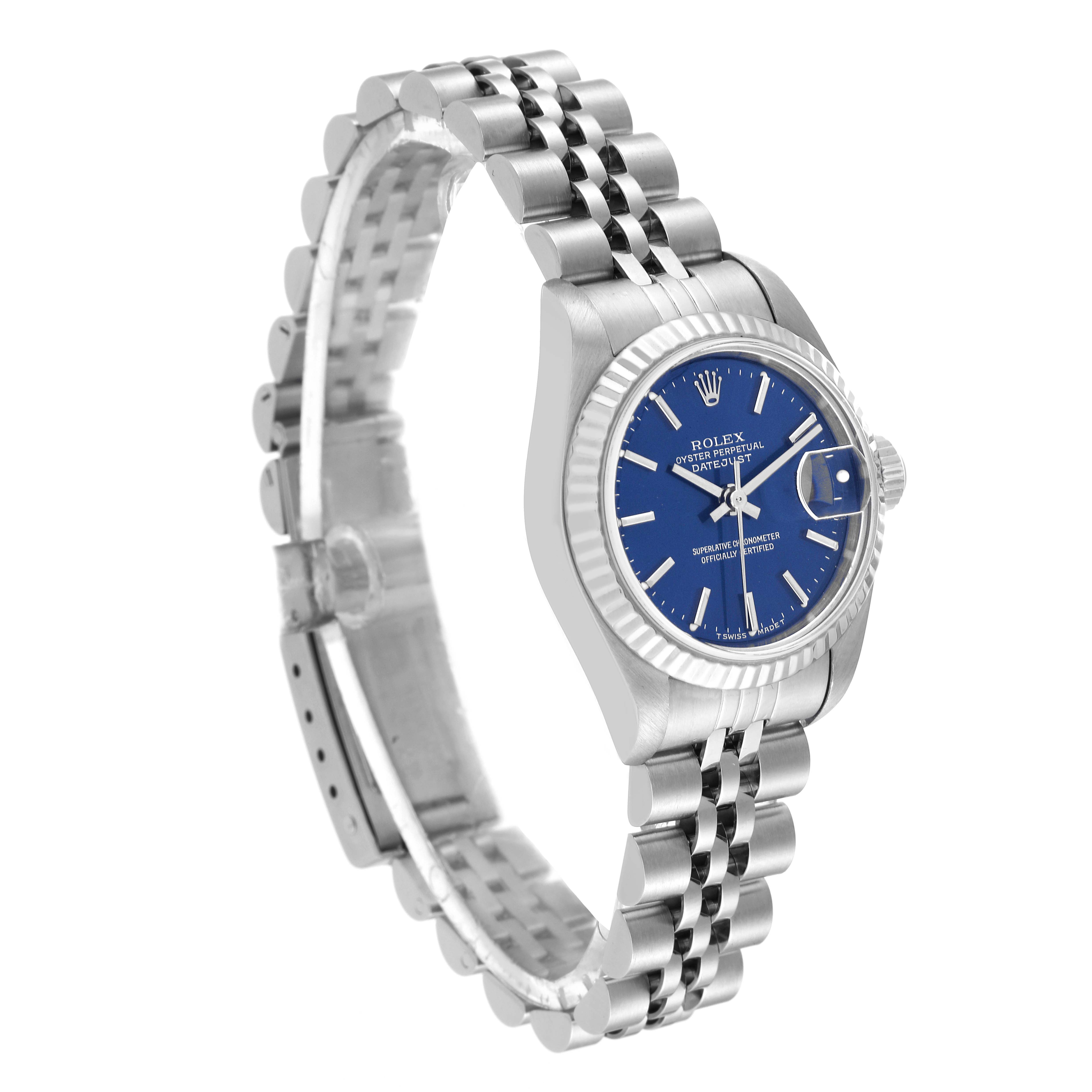 This Rolex Datejust 69174 Women's Stainless Steel Blue Dial 69174 Women's Stainless Steel Blue Dial watch is shown at a three-quarter angle, highlighting its blue dial, fluted bezel, and Jubilee bracelet.